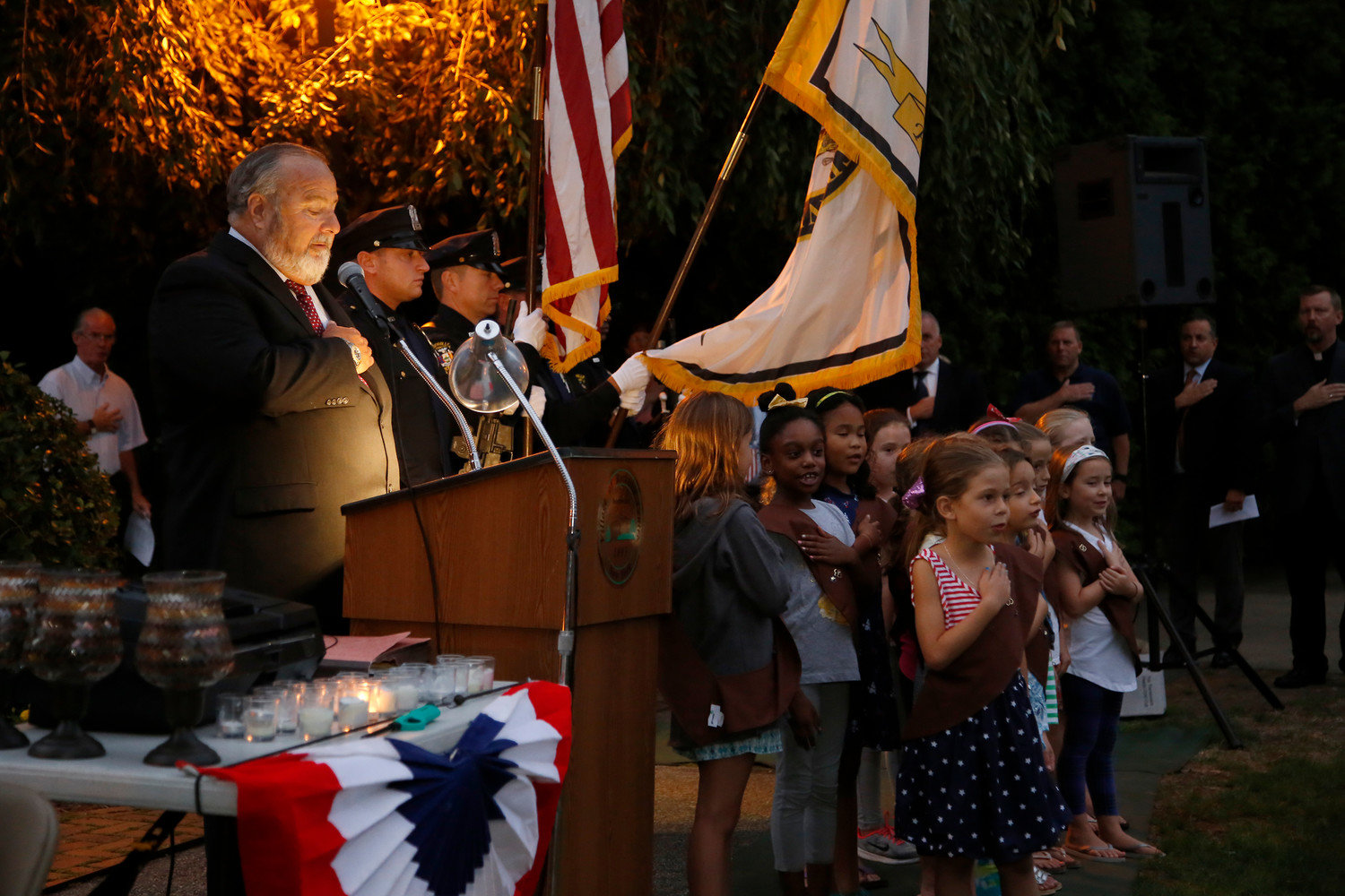 Mayor Francis Murray and local Girl Scouts led the Pledge of Allegiance before the 9/11 ceremony in 2017.