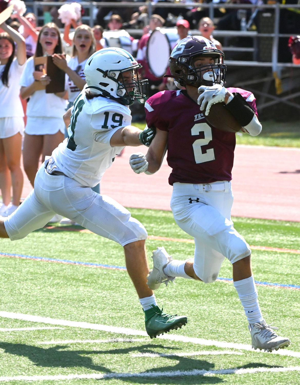 Photos by Donovan Berthoud/Herald
Nick Livoti’s 23-yard touchdown run helped North Shore roll to a 41-6 win over Locust Valley as the Vikings began their title defense.