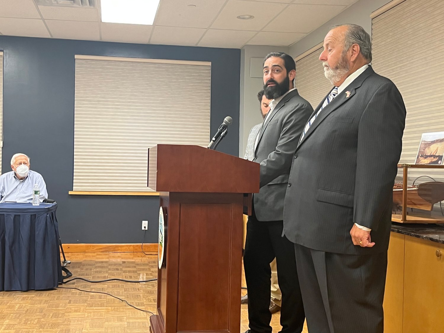 Rabbi Michael Cohen of Central Synagogue of Nassau County, far left, and Rabbi David Lerner, of B’nai Sholom-Beth David, center, join Mayor Francis Murray to pass a resolution aimed at combating antisemitism in the community.