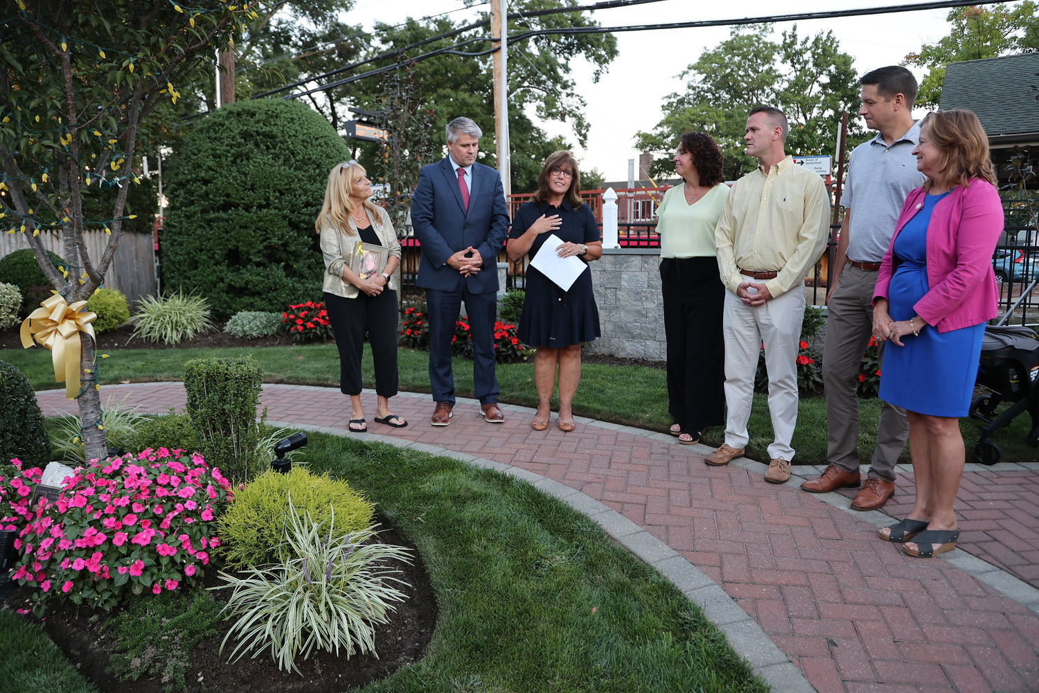 Marie Giallombardo, Mayor Keith Corbett, Carol Ruchalski, Trustees Patricia Fitzpatrick, Tim Sullivan, Carl Prizzi, and Assemblywoman Judy Griffin gathered to raise awareness of childhood cancer, as September in pediatric cancer awareness month.