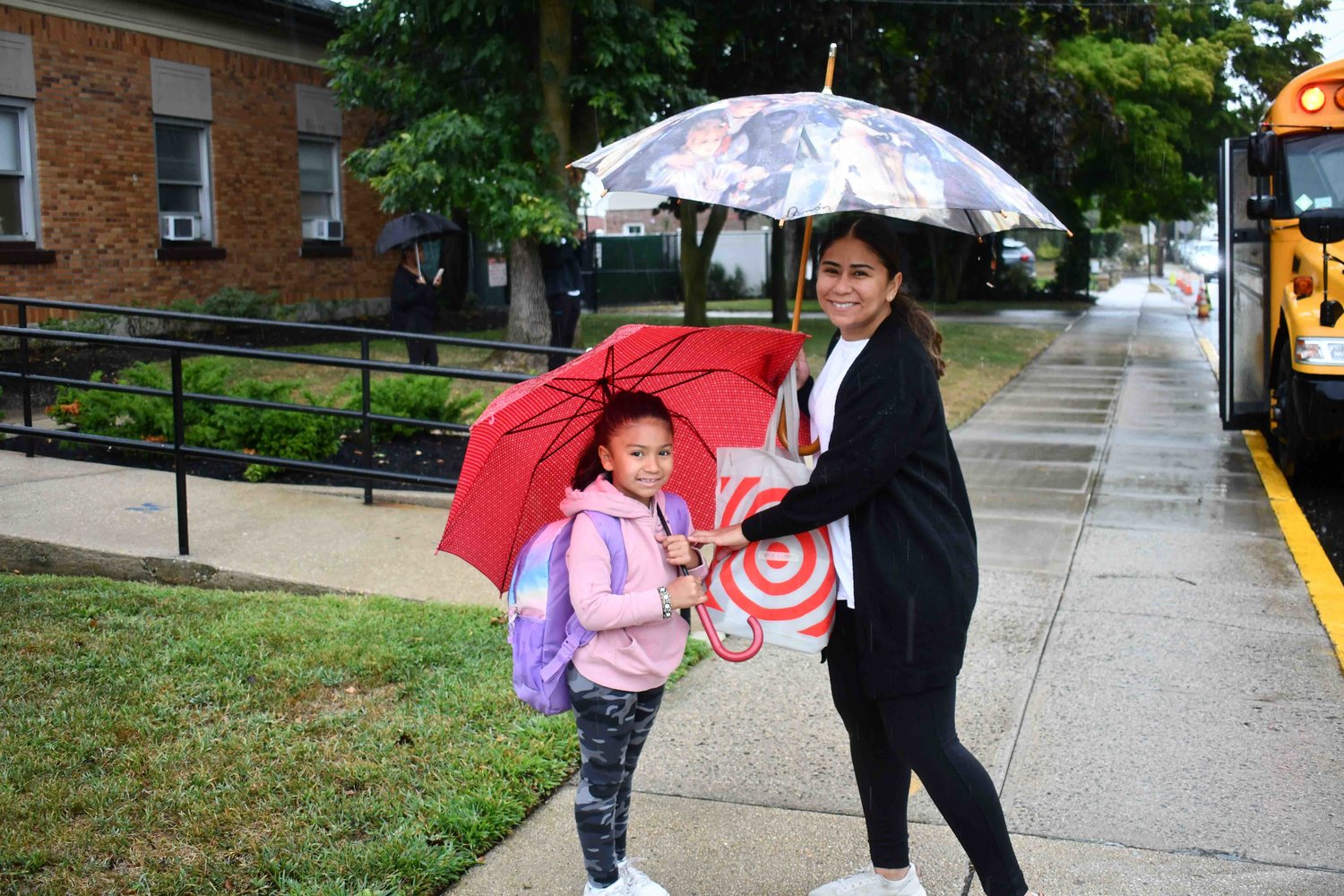 7-year-old Victoria Canales was brought to Maurice W. Downing School by her mother Ana to start her first day of second grade.