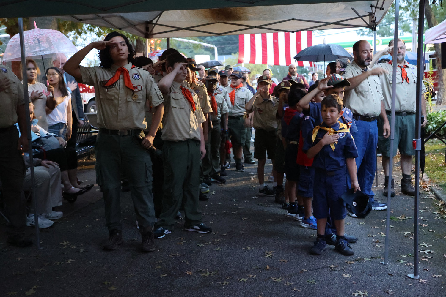 Boy Scout troop 240 stood at attention at the 9/11 memorial ceremony in Hall’s Pond Park.