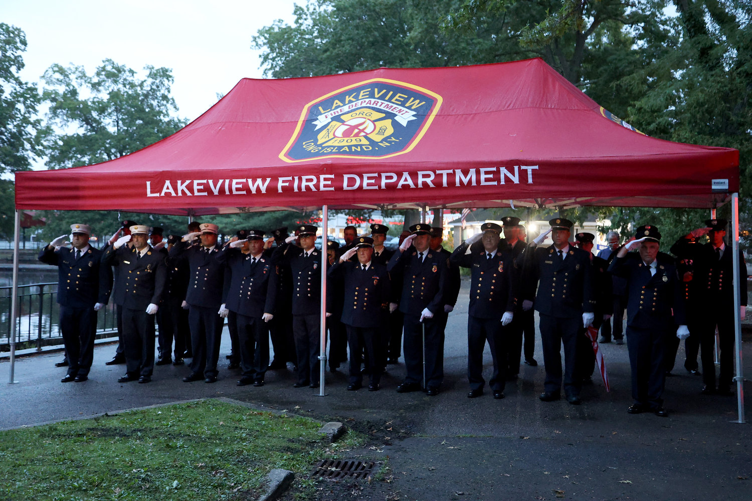 Members of the Lakeview Fire Department stood vigil in Hall’s Pond Park in West Hempstead in memory of those killed on Sept. 11, 2001, especially their fallen comrade Robert DeAngelis.