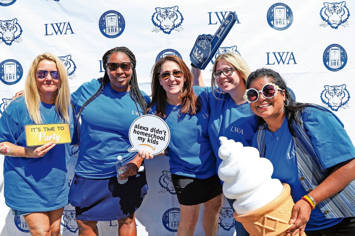 Lawrence Woodmere Academy parents, Jodi Heyward, left, Kate Dolcine, Gia Kern, Kristen Russo and Nadia Kaylan had their fun at the barbecue.