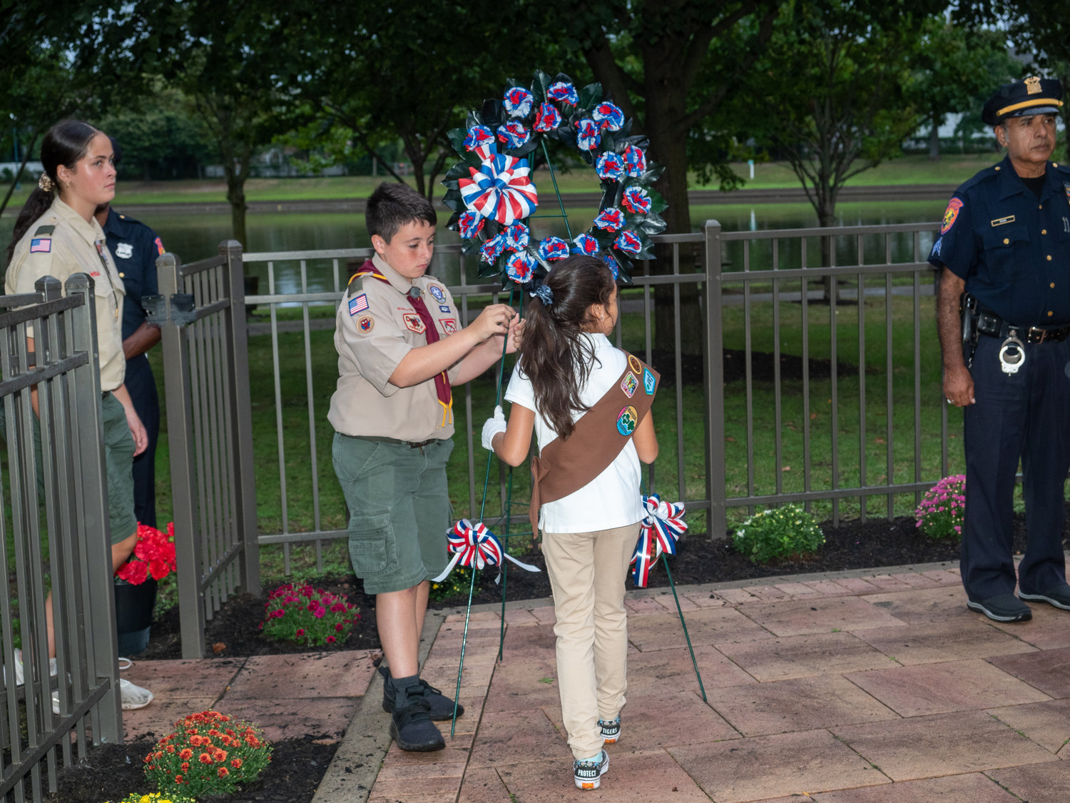 Memorial Wreathes are placed at the 9/11 memorial monument by the Valley Stream Boy and Girl Scouts.