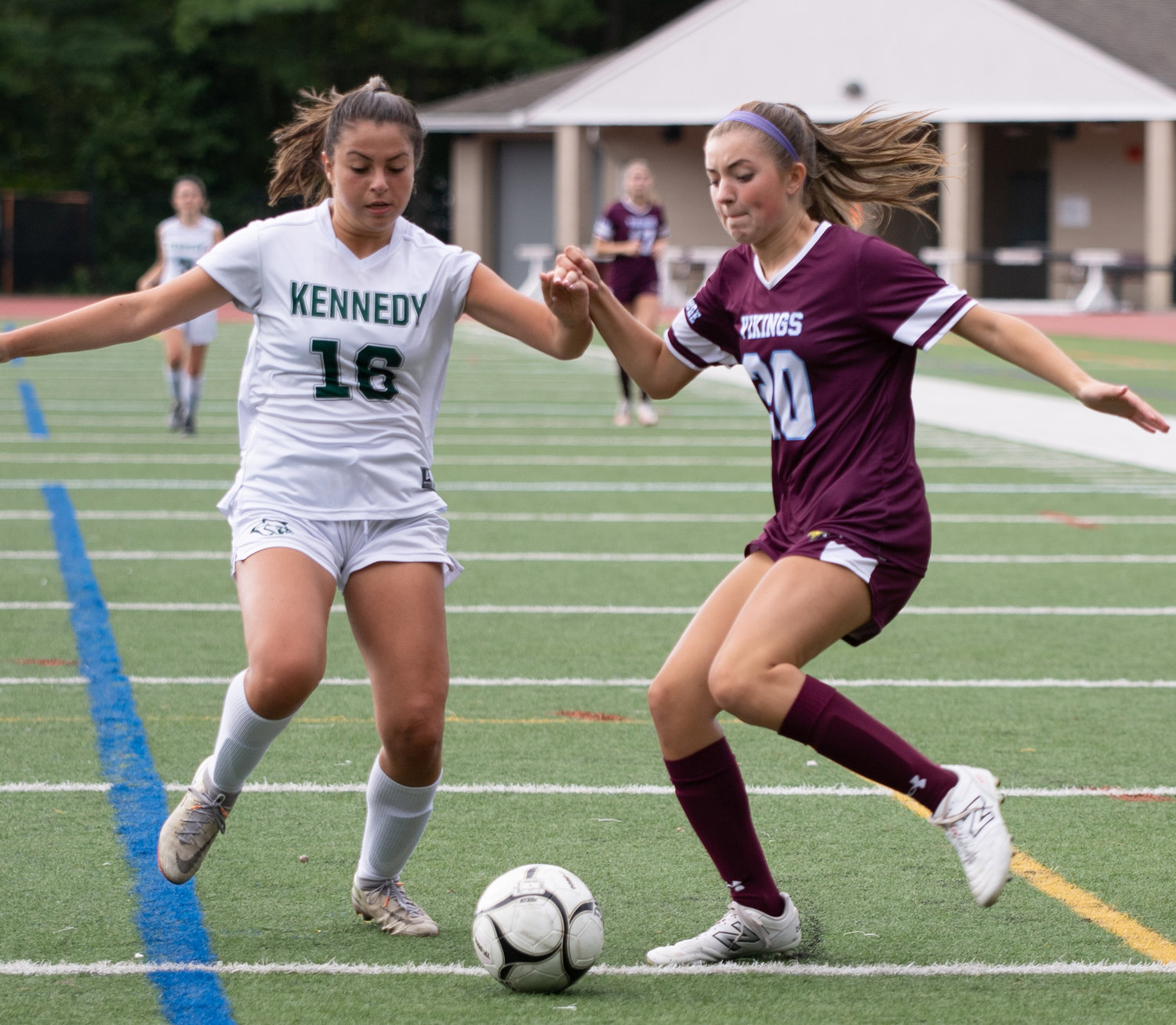 North Shore’s Vanessa Jahnke, right, battled with Kennedy’s Gabriella Mazzaferro during last Saturday’s 2-0 Vikings’ victory.