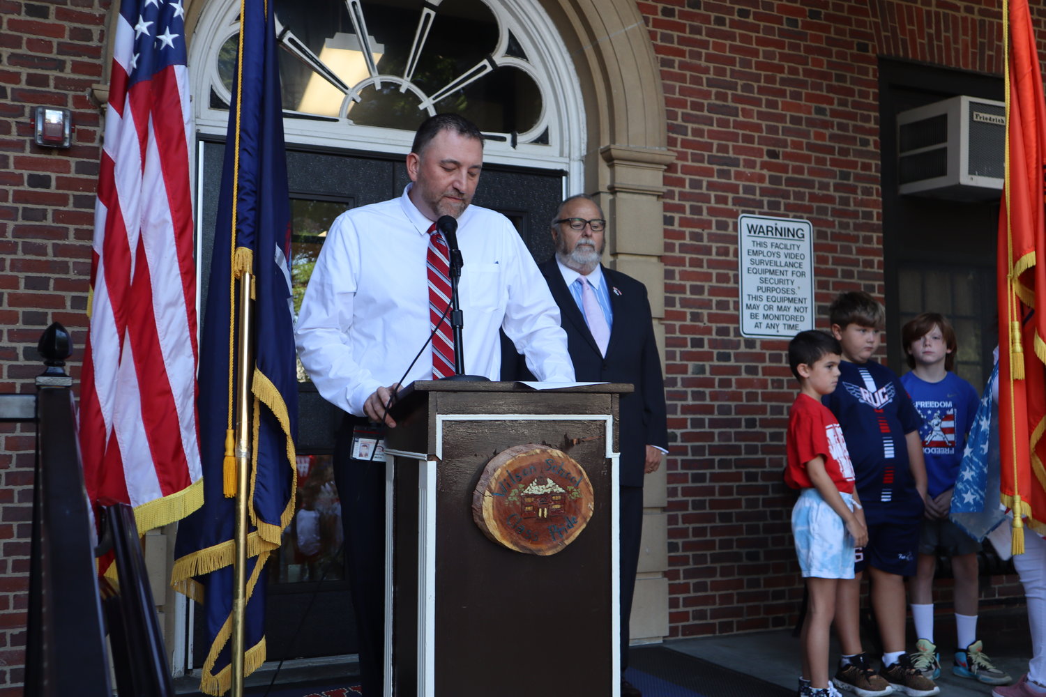 Wilson Principal Jim Duffy shares a few words with the elementary school students about 9/11.