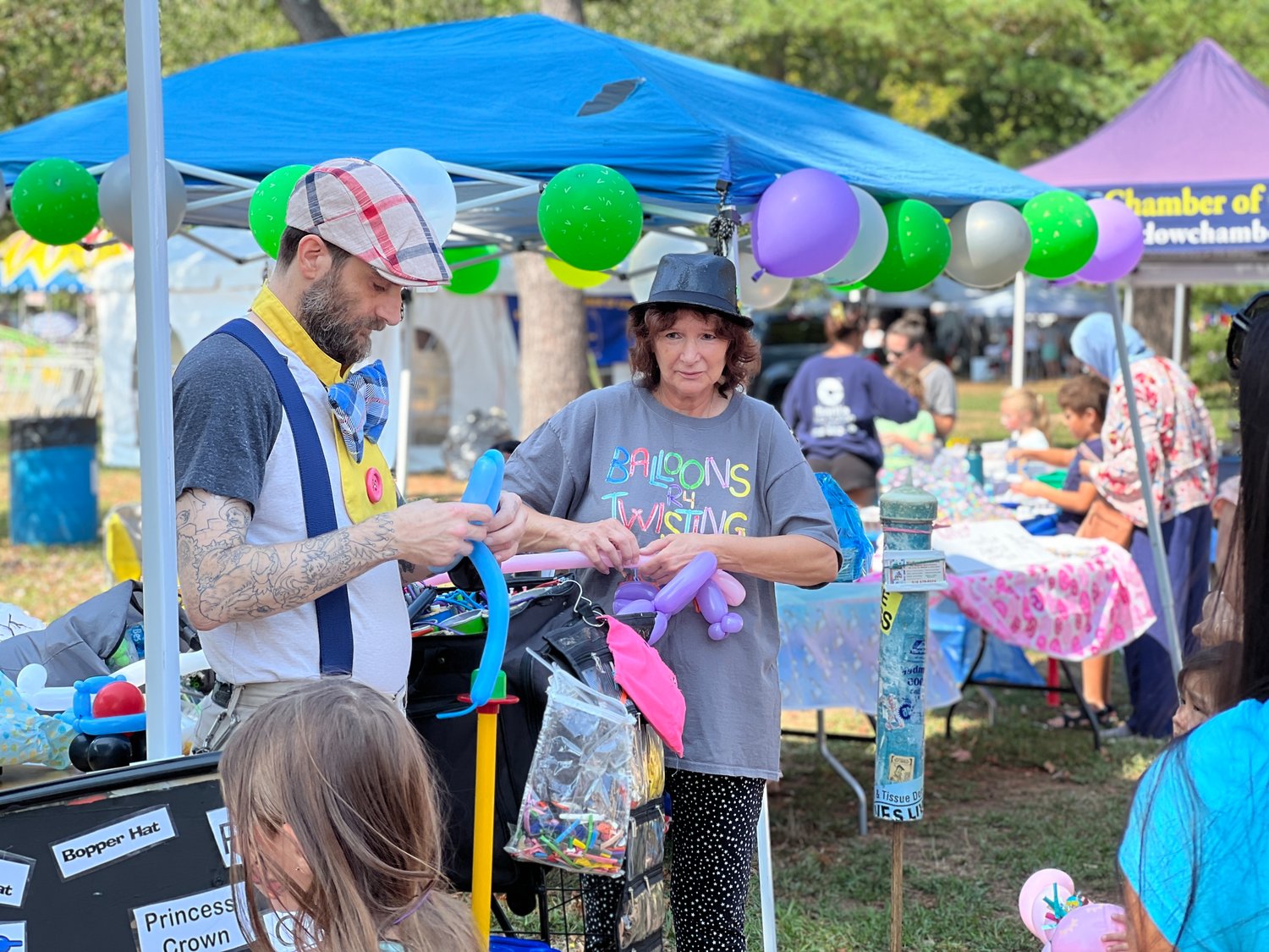 On Saturday, there were balloonists ready to make some kids very happy with a balloon animal.