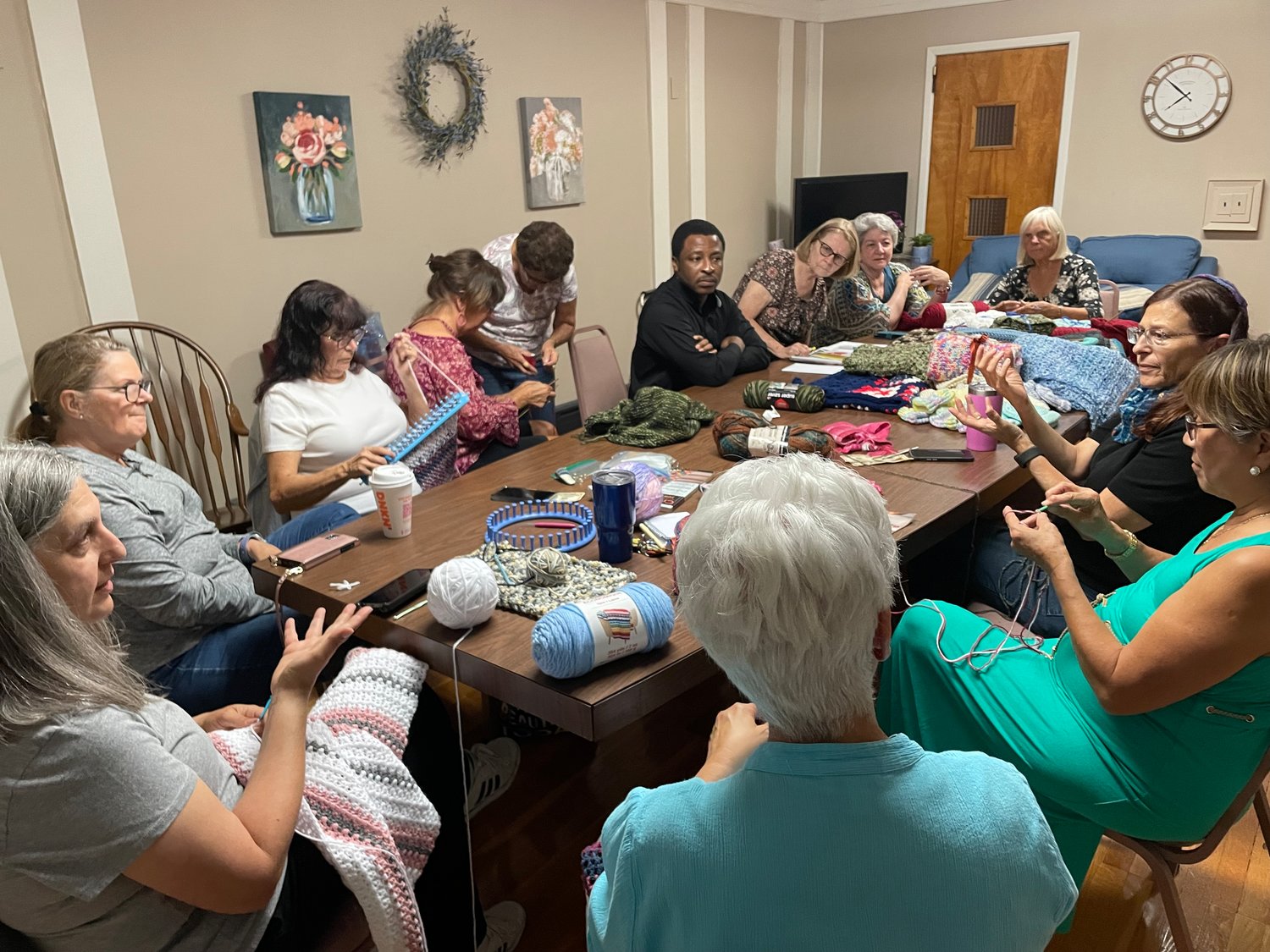 The Prayer Shawl Ministry knitting group gathered at Our Lady of Lourdes parish center on Sept. 22 to crochet for the needy, in addition to sharing stories and advice on technique.
