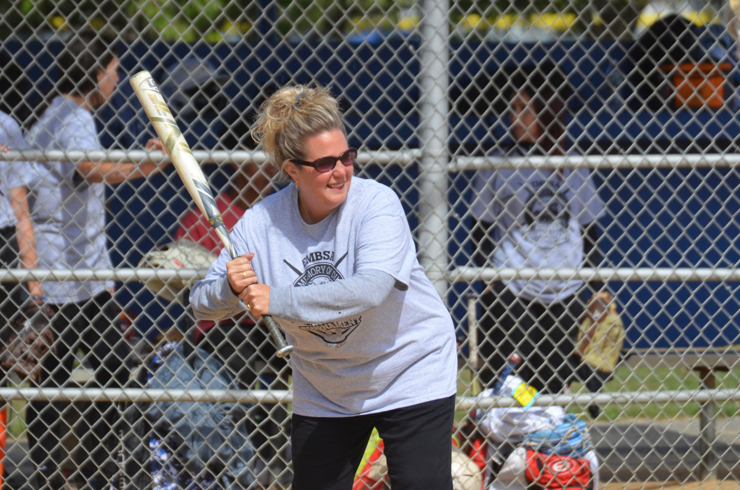 Rose Komis played softball last Saturday in memory of her husband, Dino. Nearly 200 people came out over the course of two days to play.
