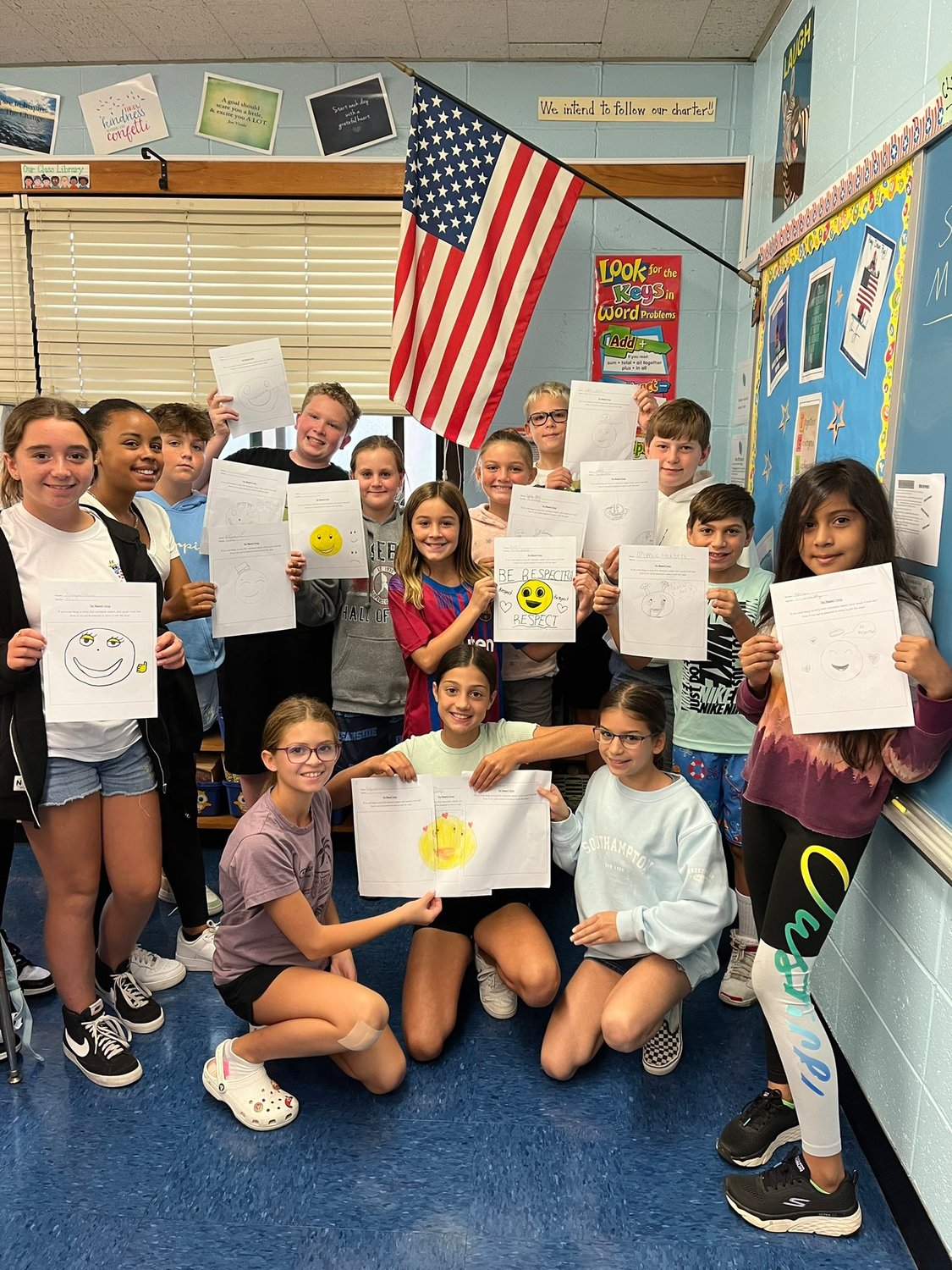 Sixth graders at School #2 show off their new emotionally intelligent emojis drawings.