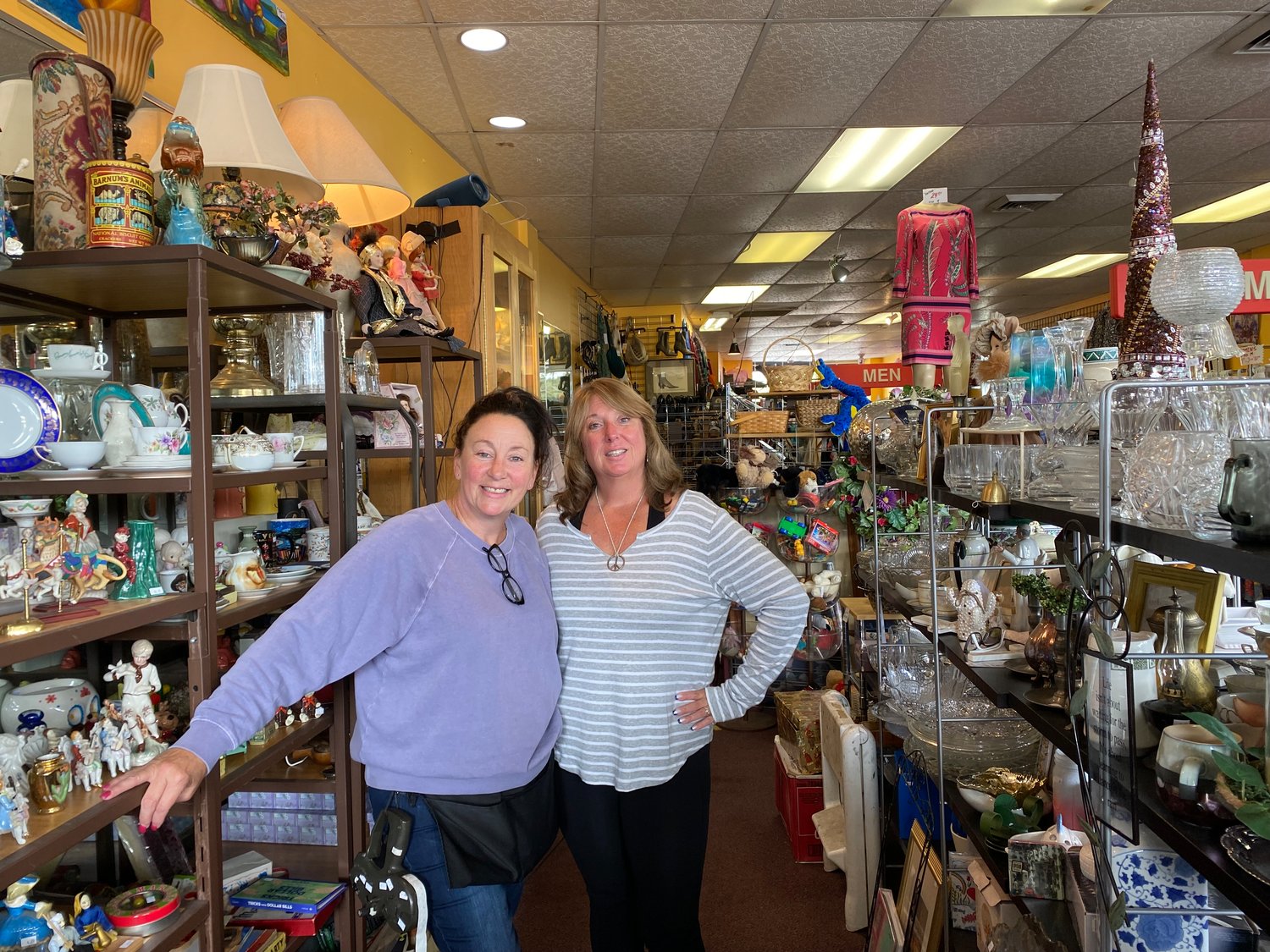Deirdre Stammers, owner of Glorybeezzz Thrift with a Twist, with employee Liz Hastings, said she welcomed the Grand at Baldwin development because it would increase foot traffic and bring new merchants to Baldwin.