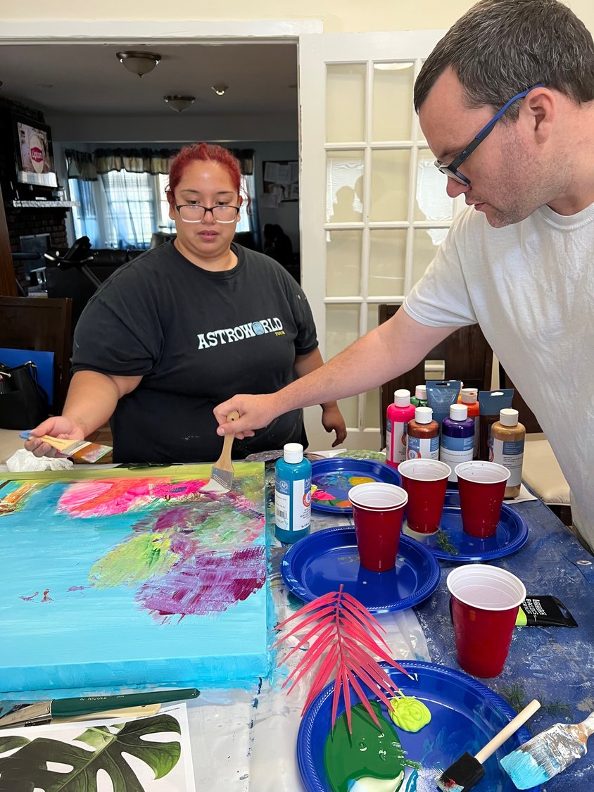 Arleigh House, in East Meadow, a home for intellectually and developmentally disabled adults, took part in a collaborative art experience. Cheryl Leonardo and Daniel O’Shea were two of the residents who helped create the house’s art piece.