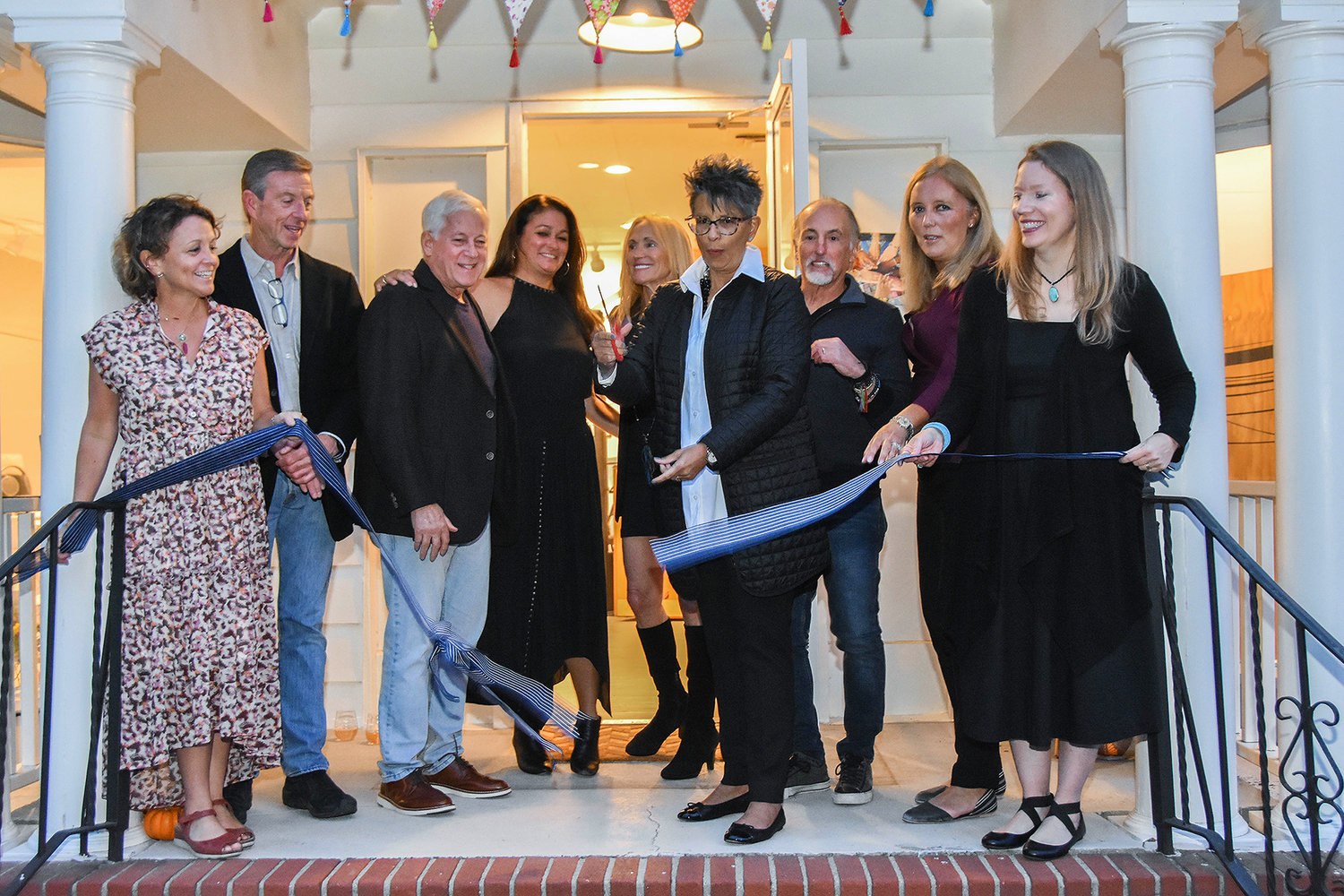 Members of the Arts Council and government officials helped cut the ribbon before opening the doors of the new building.