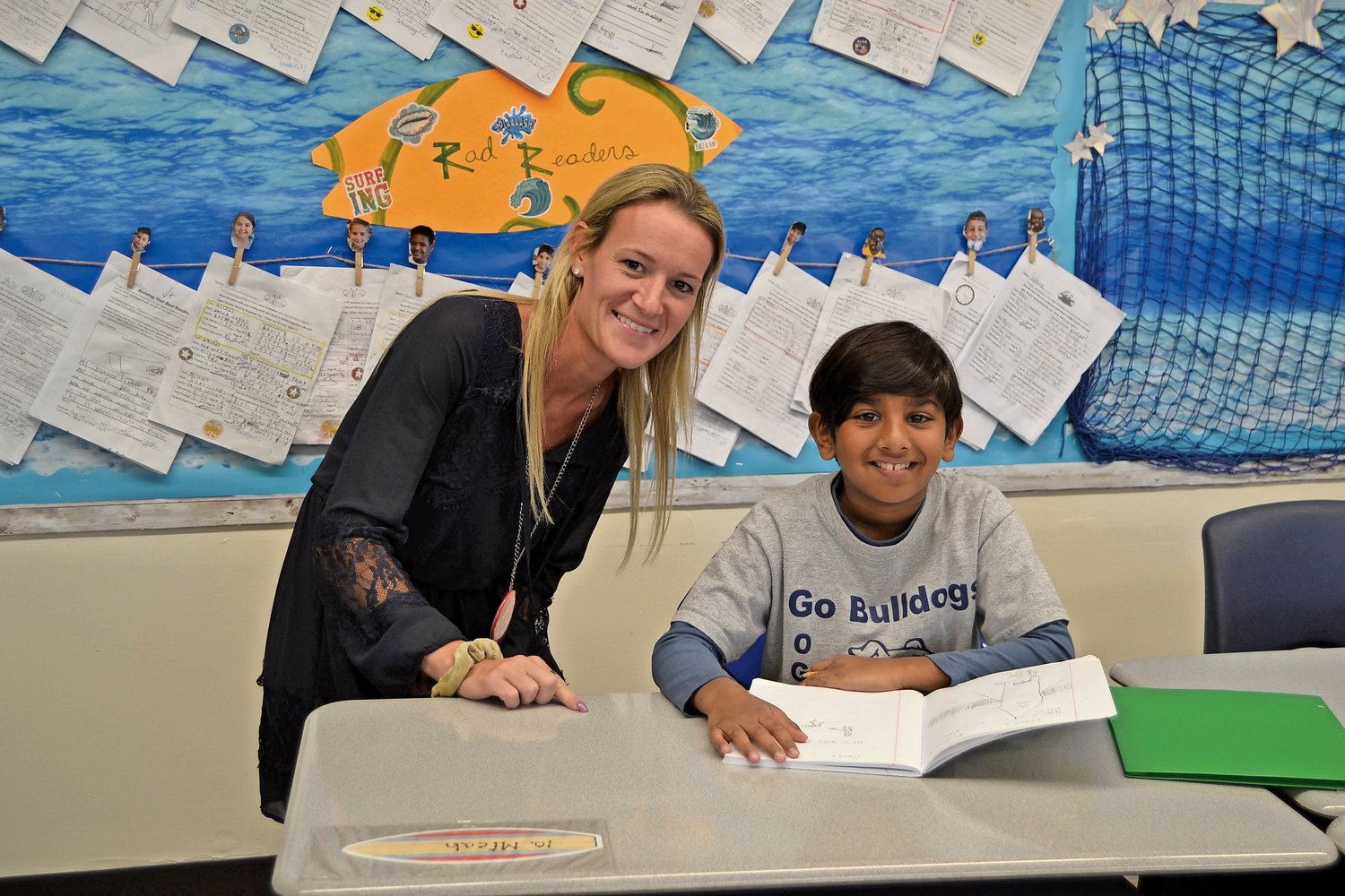 Ogden Elementary School teacher Cortney DelGrosso with student Micah Koshi who are part of the sixth best school district in New York based on the latest Niche rankings.