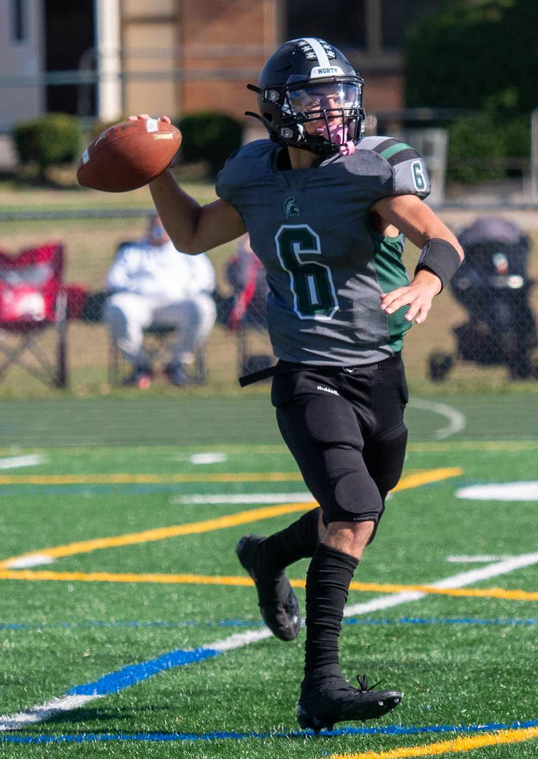 Senior quarterback Nick Naumov had a touchdown run and 156 yards passing as the Spartans improved to 2-3 on the season.