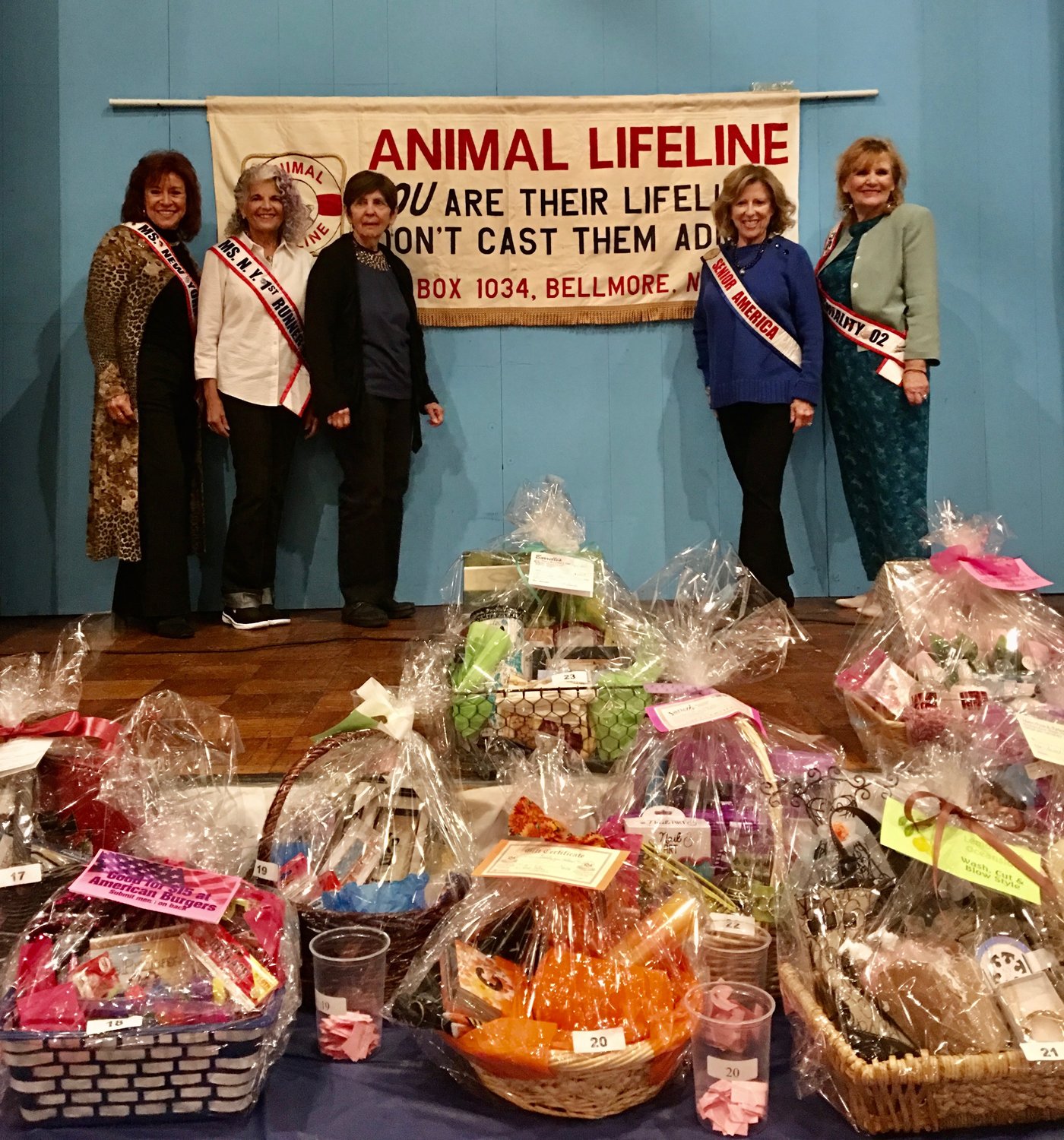Dolores Hofman, far left, with Phyllis Bogart, Betty Tucker, Marleen Schuss and Pat Tropea, helped raise awareness of abandoned animals that need to be rescued and sheltered at the 2016 Ms. New York Senior America event. That was one of a number of ways in which Animal Lifeline, which Hofman runs, has publicized its efforts to rescue and foster strays.