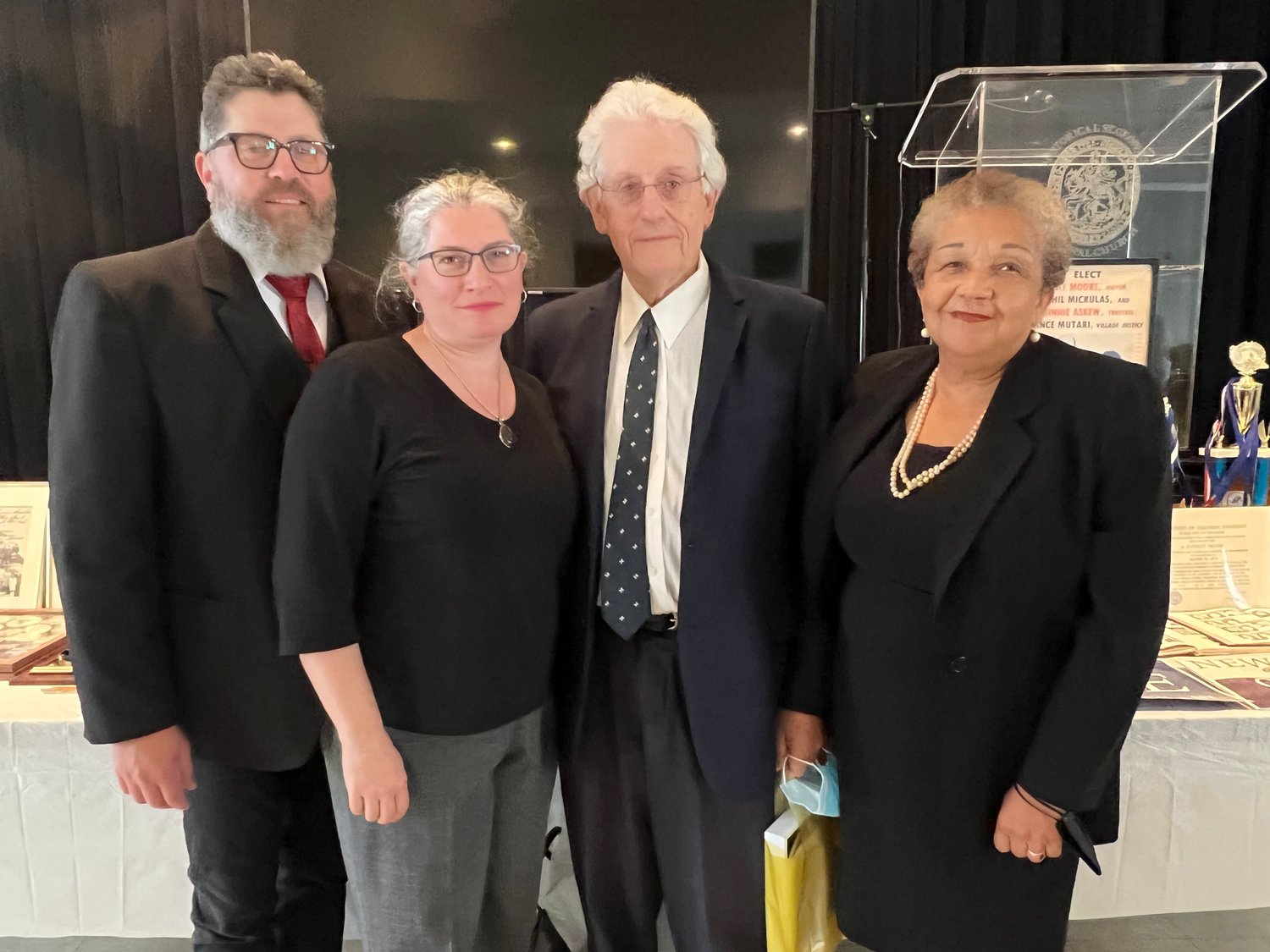 Pat’s Canadian relatives, Mark, Sarah, and Julian Vaughan-Jackson, met her Hempstead friends and neighbors at the memorial celebration. Shown with them at right is Christina Lightbourne, a warden of St. John the Evangelist Church in Lynbrook.