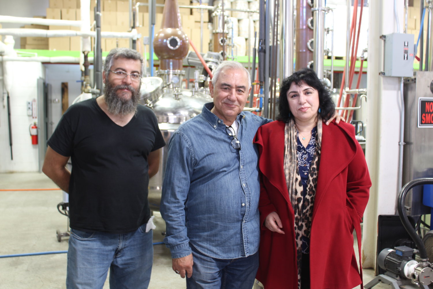 John Dianellos, Roman Fuzaylov, and Olga Abdurakhmanq are business partners together operating Oceanside’s Old Spirit Distillery.
