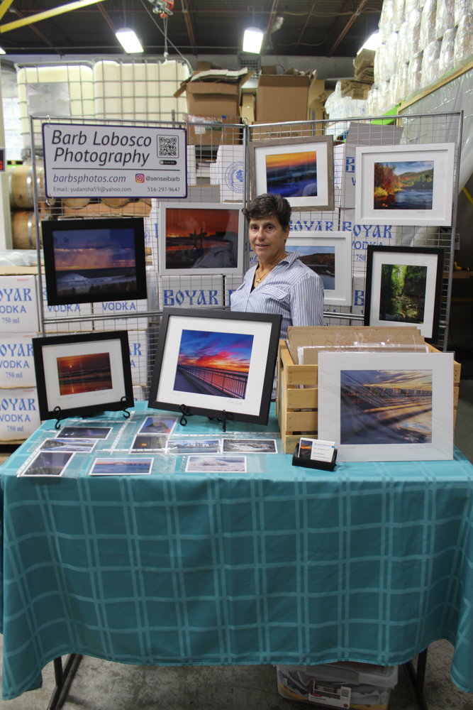 Colorful and vibrant, Barb Lobosco and her artwork go hand in hand, documenting many Long Island twilights and dawns.