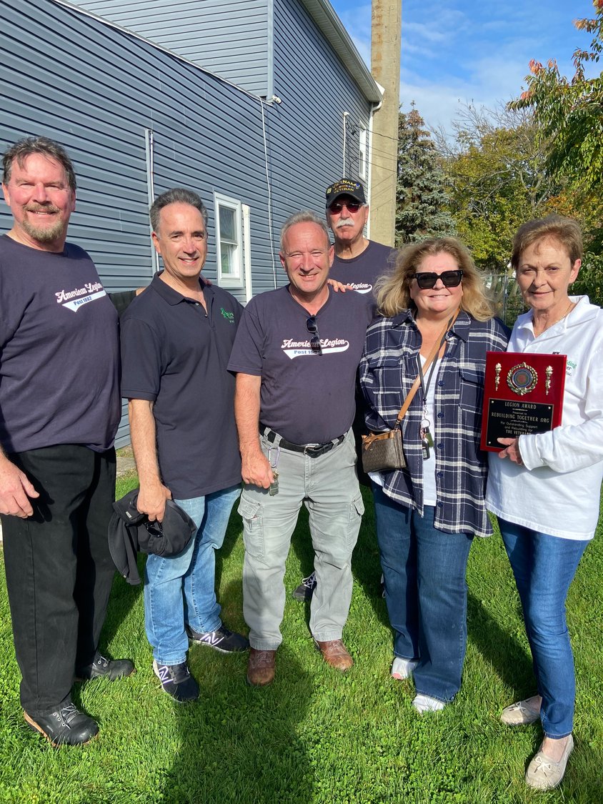 From left, Pete Wenninger, Steven Walker, vice president of RTLI,  Bill McCrindle and Dan Carbonare, of the East Meadow American Legion, Eileen Napolitano, and Stella Hendrickson, president of RTLI enjoyed an afternoon of barbeque and recognition.
