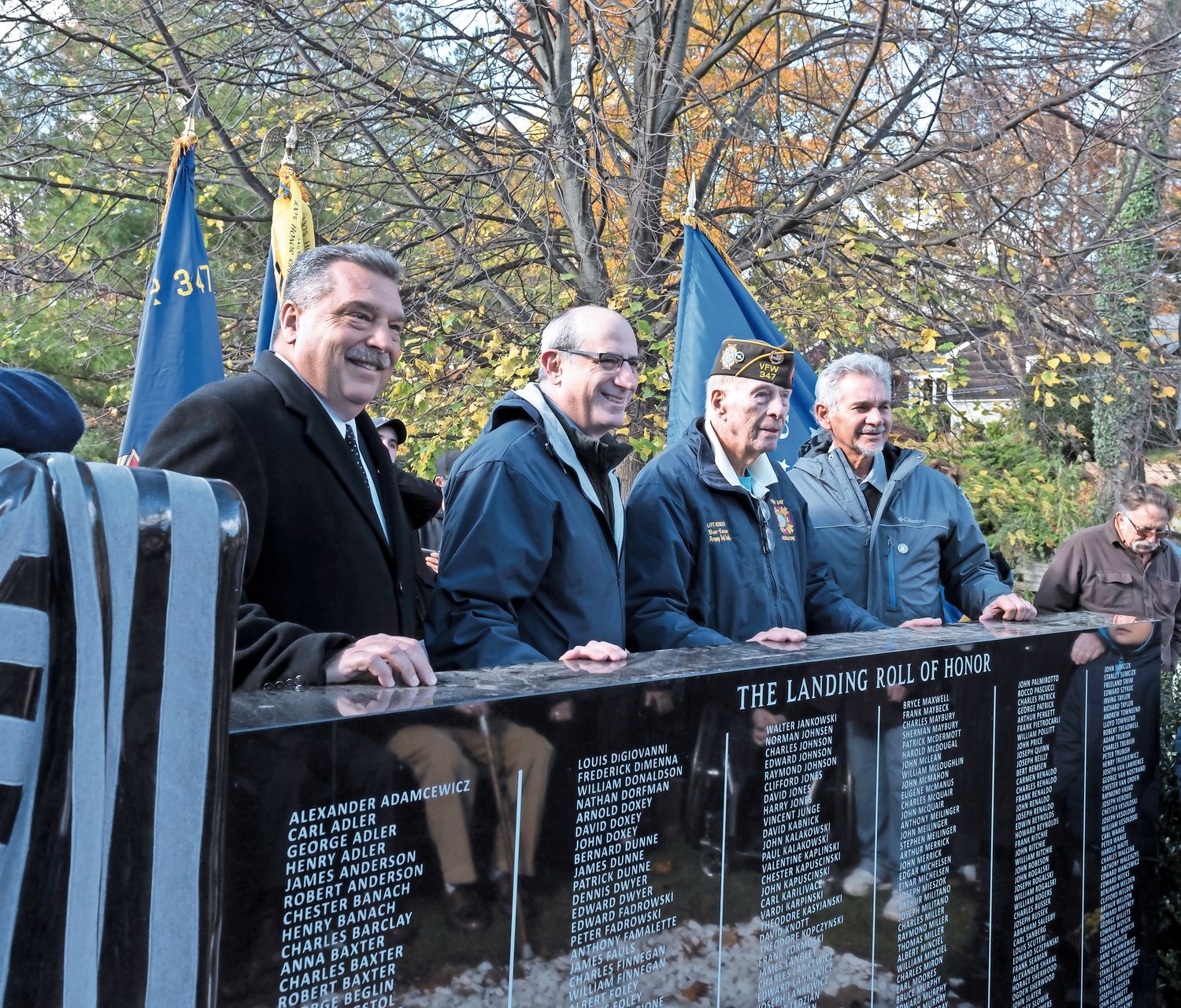 Bernard Farnan, second from right, attended the dedication of the Landing World War II Monument in Morgan Park in 2020.