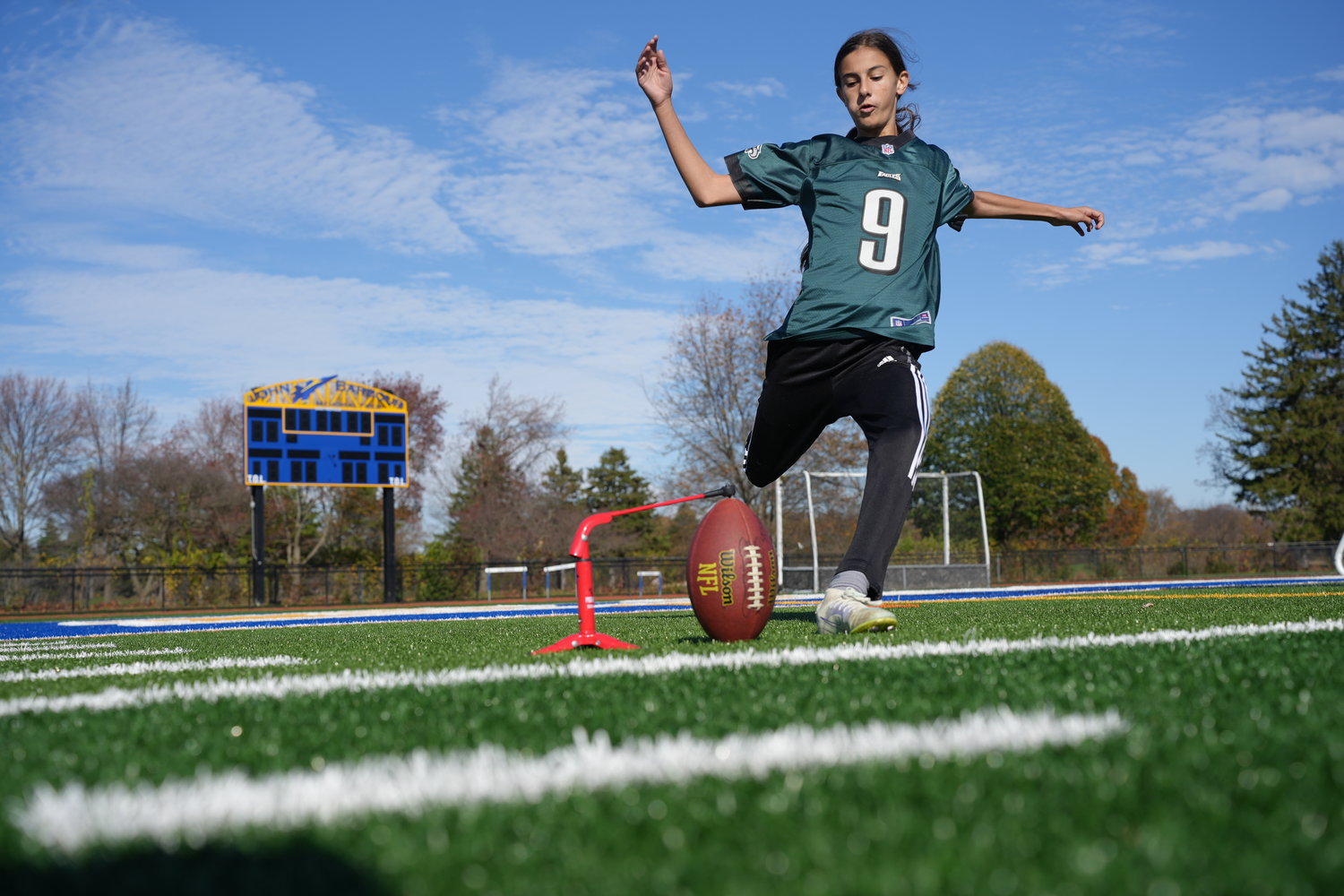 Elizabeth Serra, 13, just finished her first season as a kicker and wide receiver for the Woodland Jets football team. She scored 16 points this season for the team.