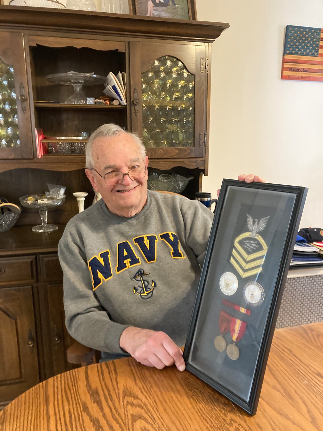 Reginald Butt, who was a chief radio operator in the Navy, received medals for his service. He is the commander of Oyster Bay’s American Legion.