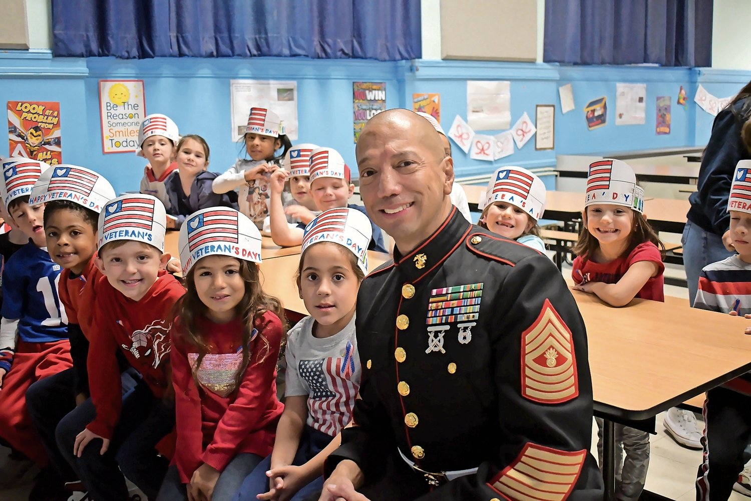 U.S. Marine Corps Master Gunnery Sergeant John Escalante with Centre Avenue School students.