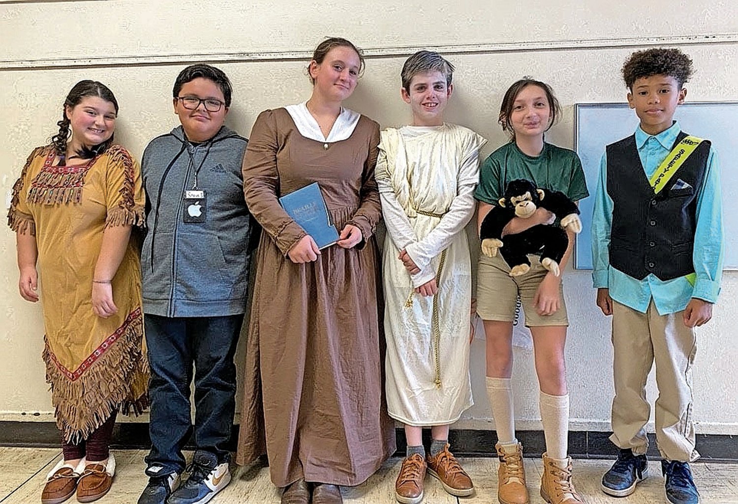 Centre Avenue School students presenting their Historical Figure Biography Project. From left to right, Pocahontas, Steve Jobs, Helen Keller, Plato, Jane Goodall and Thomas Edison.