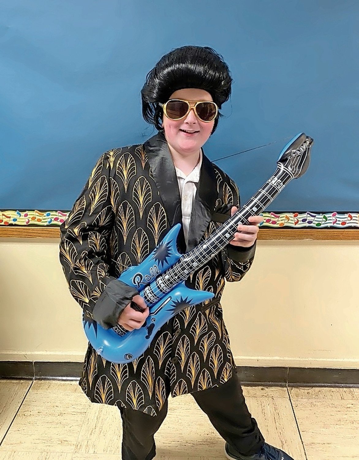 A Centre Avenue student presents their Historical Figure Biography Project on Elvis Presley.