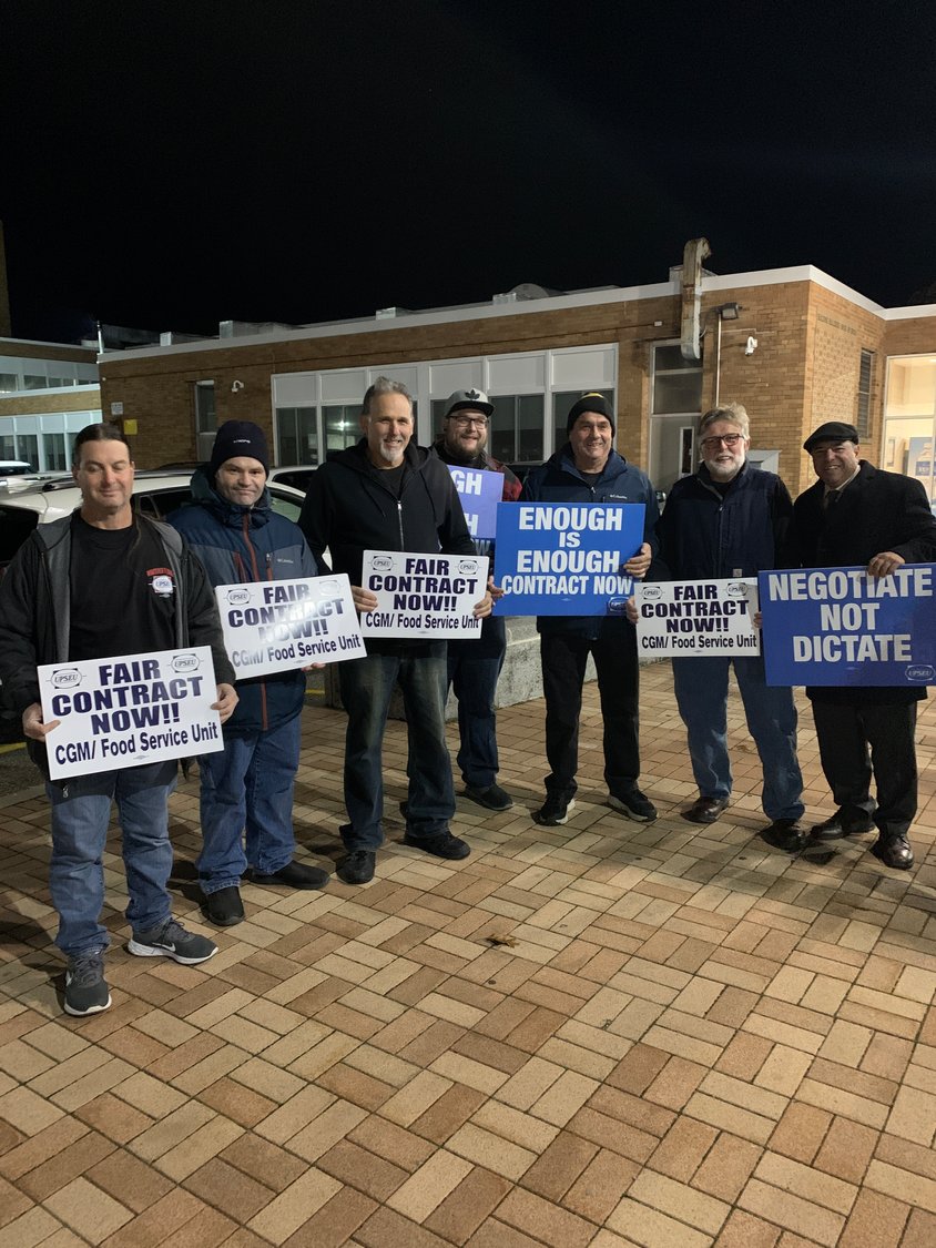 The Hewlett-Woodmere School District custodial staff joined the walk for a new contract on Nov. 16.
