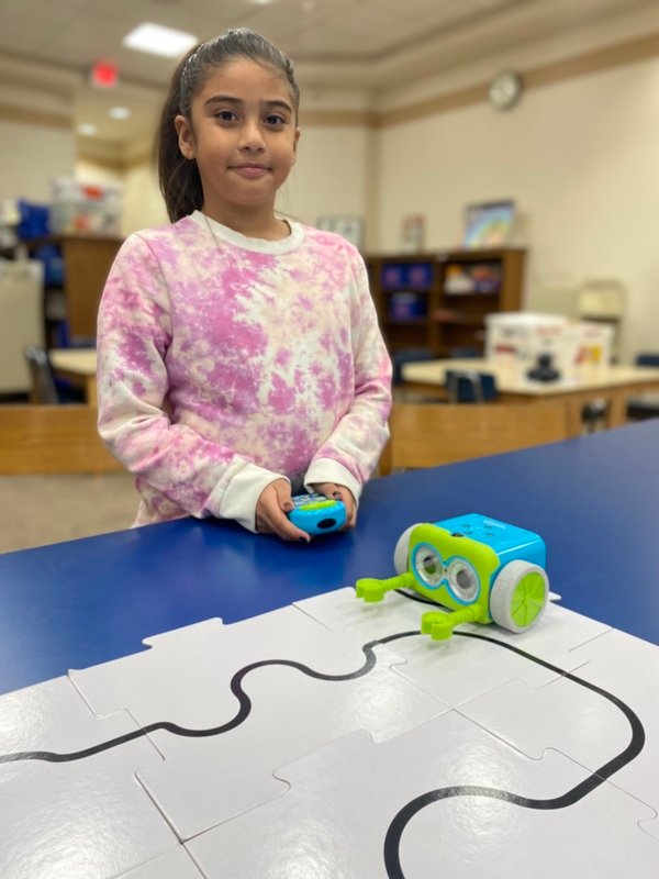 Lawrence Primary School student Annabella Romero learned to code using the Botley and Dash robots brought by Peninsula Public Library children’s librarian Pat Murphy.