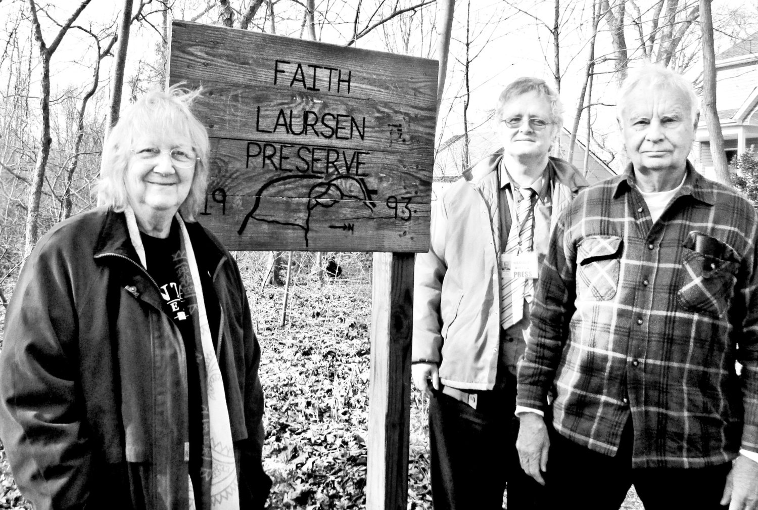 Paul Laursen, center, with Barbara and Bill Wood at the 25-acre Faith Laursen preserve, which was established in 1993 in his mother’s name.