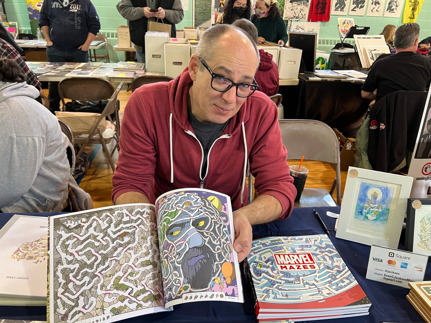 Sean Jackson displayed his new book, which features illustrations of mazes in the Marvel Universe.