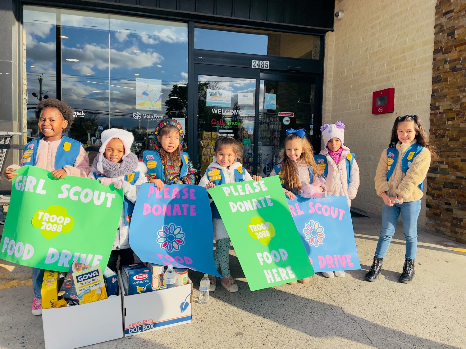Members of Baldwin Daisy Girl Scout Troop 2088 helped collect food and monetary donations for the needy who visit St. Christopher’s Food Pantry last week.