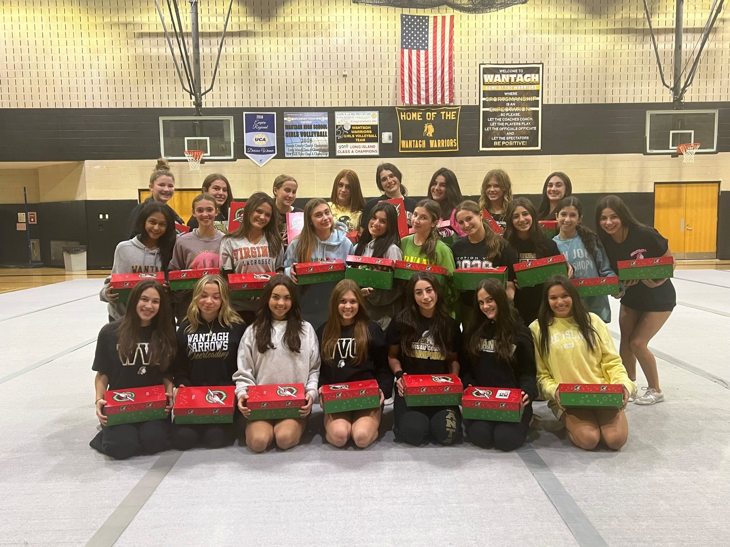 The Wantagh High School cheerleading team takes part in Samaritan’s Purse, a Christmas toy drive for children, every year. This year, sophomore Kayla Spisto, middle row, third from left, took the drive to new heights.