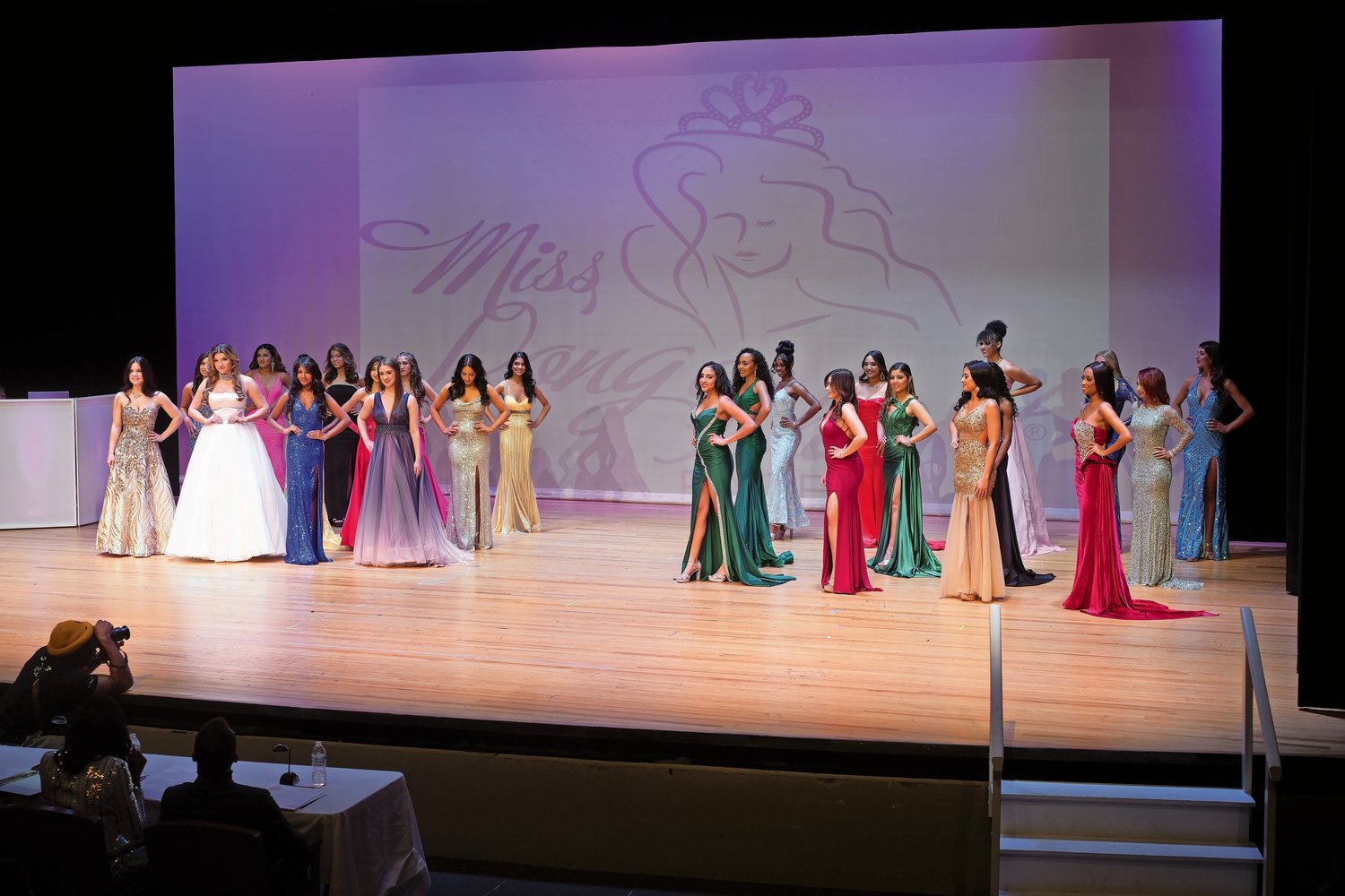 Tim Baker/Herald photos
Miss Long Island contestants hit the stage at the Madison Theatre in their glorious gowns, showing their best for judges Matthew James Graziano, Yasmeen Gumbs, Amy Amato of RichnerLive, Peter Andolina and Edson Estime