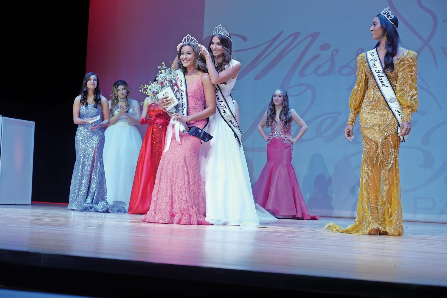 The 2022 Miss Teen Long Island winner Jessica Fuentes crowns her successor, Natalia Suaza, of Valley Stream.
