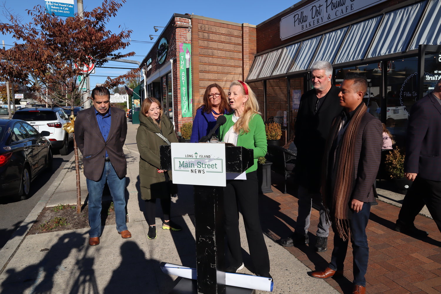 Lisa Umansky, owner of Polka Dot Pound Cake and president of the Rockville Centre Chamber of Commerce, held a news conference last Saturday to promote Small Business Saturday.