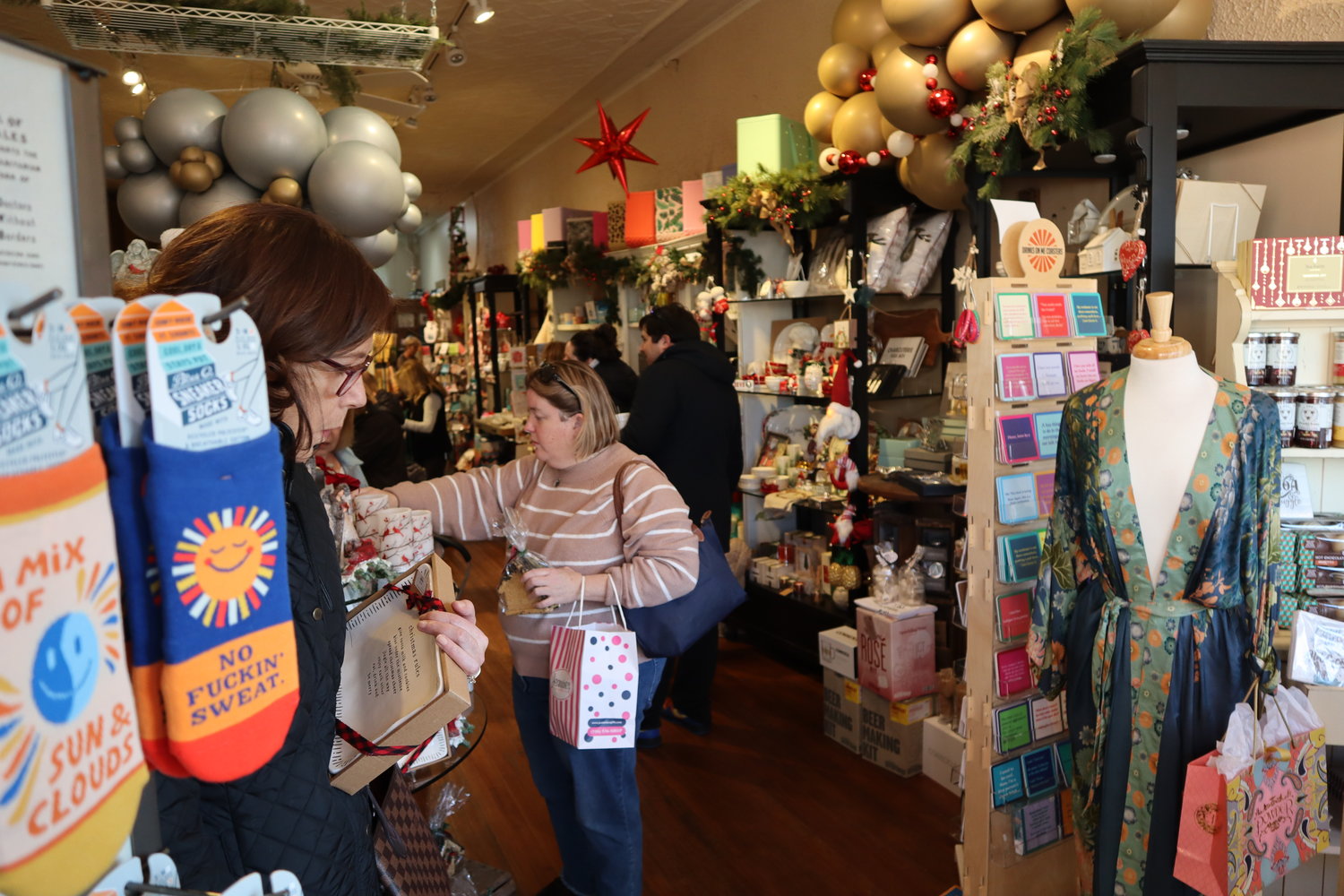 Dozens of shoppers browsed the shelves at the Giftologist, on Park Avenue in Rockville Centre.