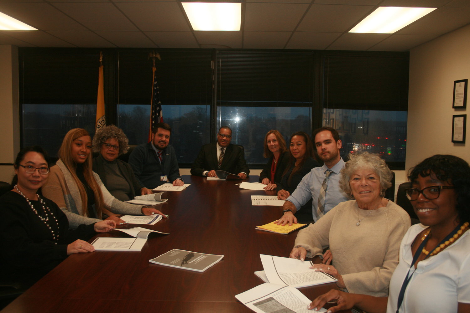 HempsteadWorks employees Lily Dou, far left, Tamia Anderson, Maria Reed, Kurt Rockensies, Eric Mallette, Mary Drangel, Nene Alameda, Christopher DeRita and Jeanie Robano-Stocker provide comprehensive career services for Hempstead residents.
