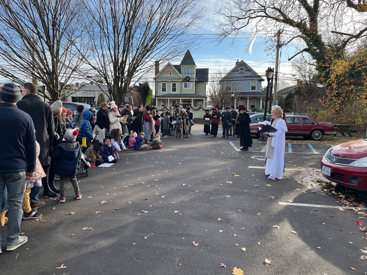 Through the power of imagination, a parking lot became Scrooge’s childhood boarding school during ‘A Christmas Carol,’ performed by members of the Sea Cliff Civic Association.