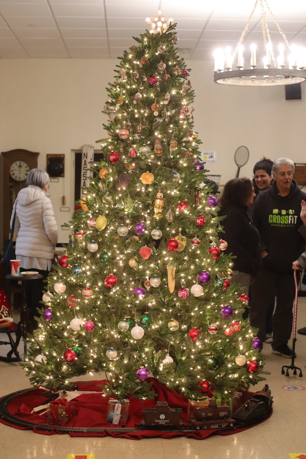 The nine-foot-tall Christmas tree adorned in handblown German ornaments was the main attraction of the open house event.