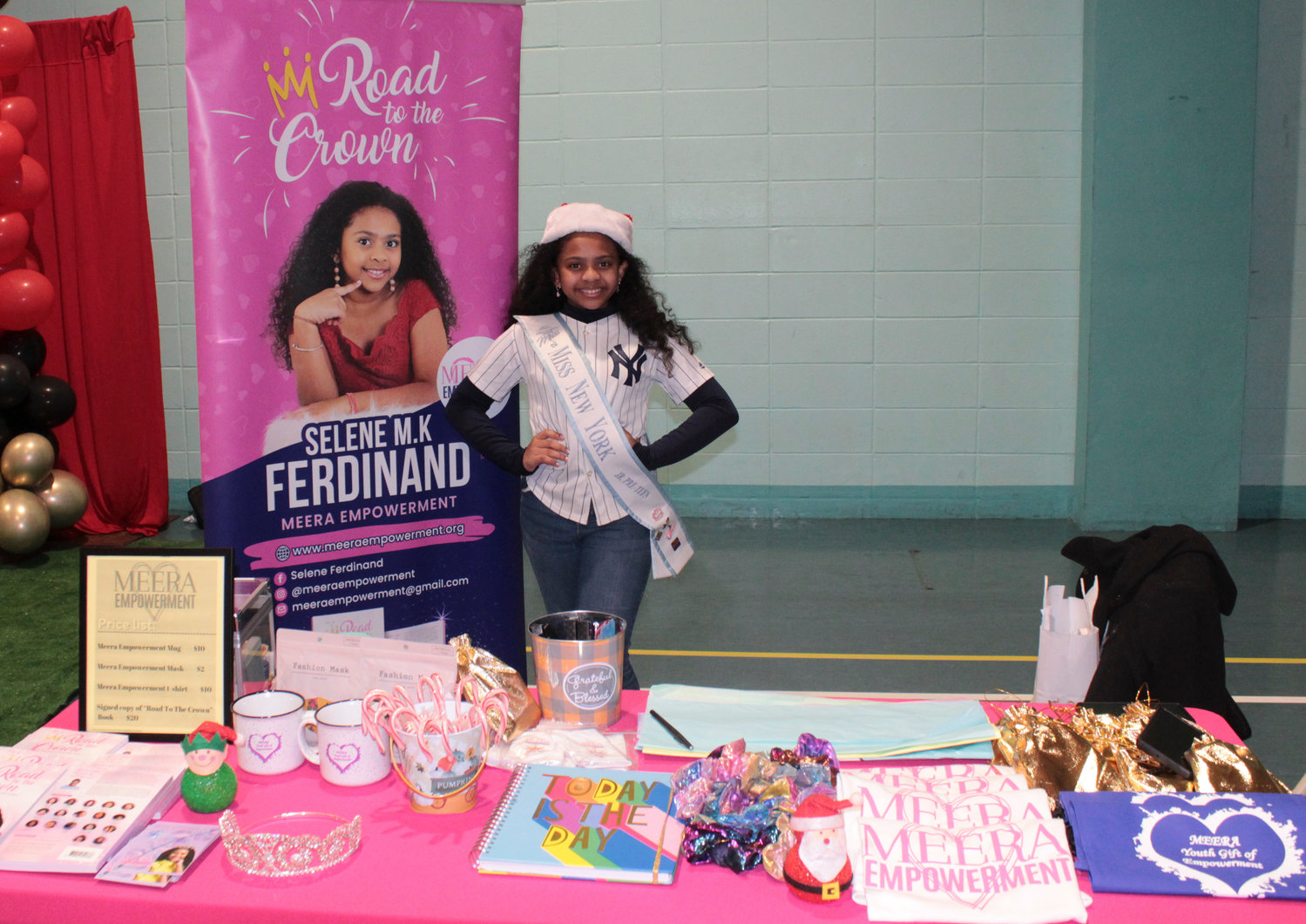 Selene Ferdinand represented the brand she created, Meera Empowerment, with pride at the Young Entrepreneurs Expo. Ferdinand promoted her book, ‘Road to the Crown,’ which she co-wrote with 17 other young women from the world of beauty pageants, as well as other merchandise for her organization.