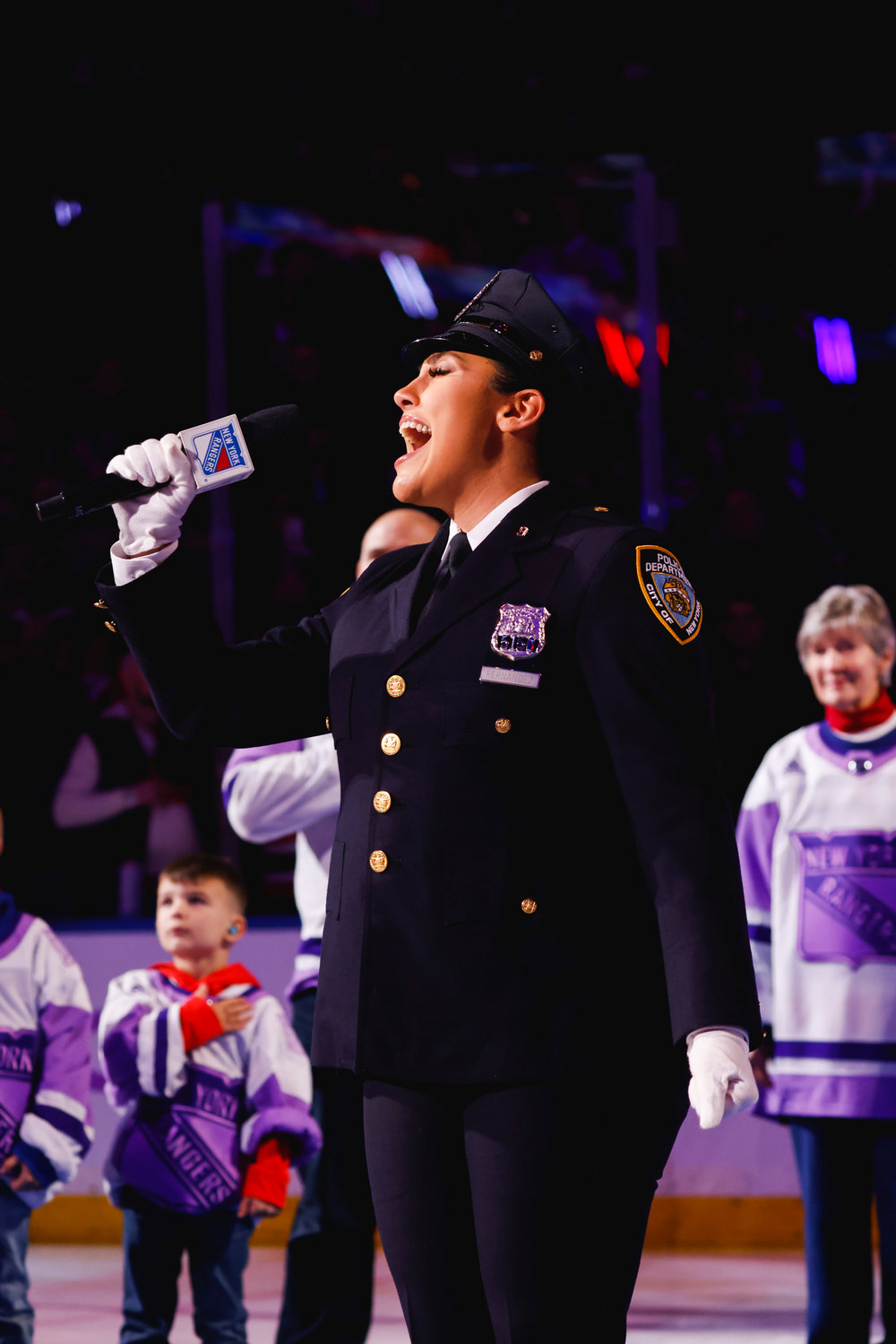 NYPD officer Brianna Fernandez sang a stunning rendition of the ‘Star-Spangled Banner’ to kick off the New York Rangers game Nov. 28.