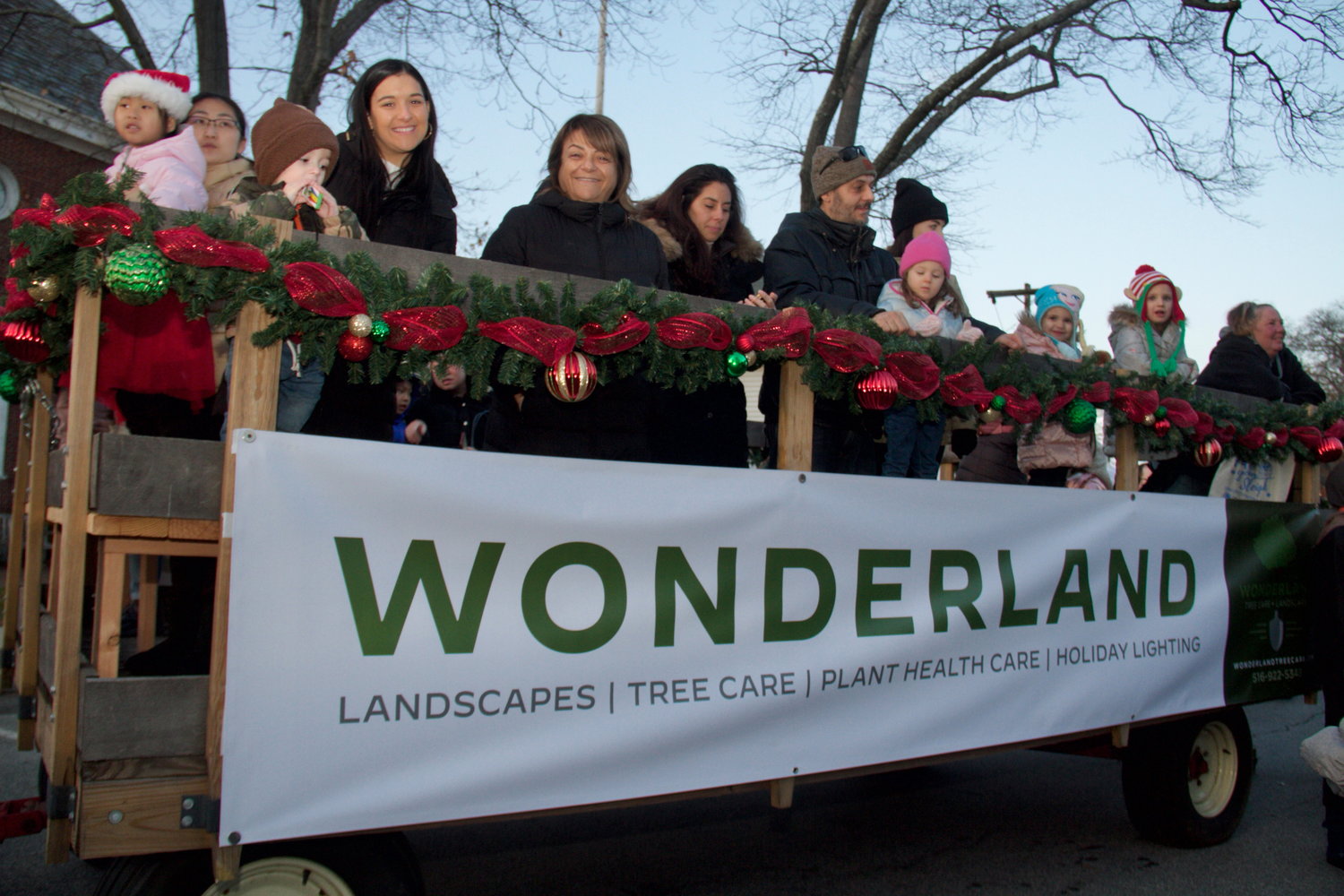 At this holiday event people were offered a ride through Oyster Bay in style on a hayride provided by Wonderland Tree Care + Landscape.