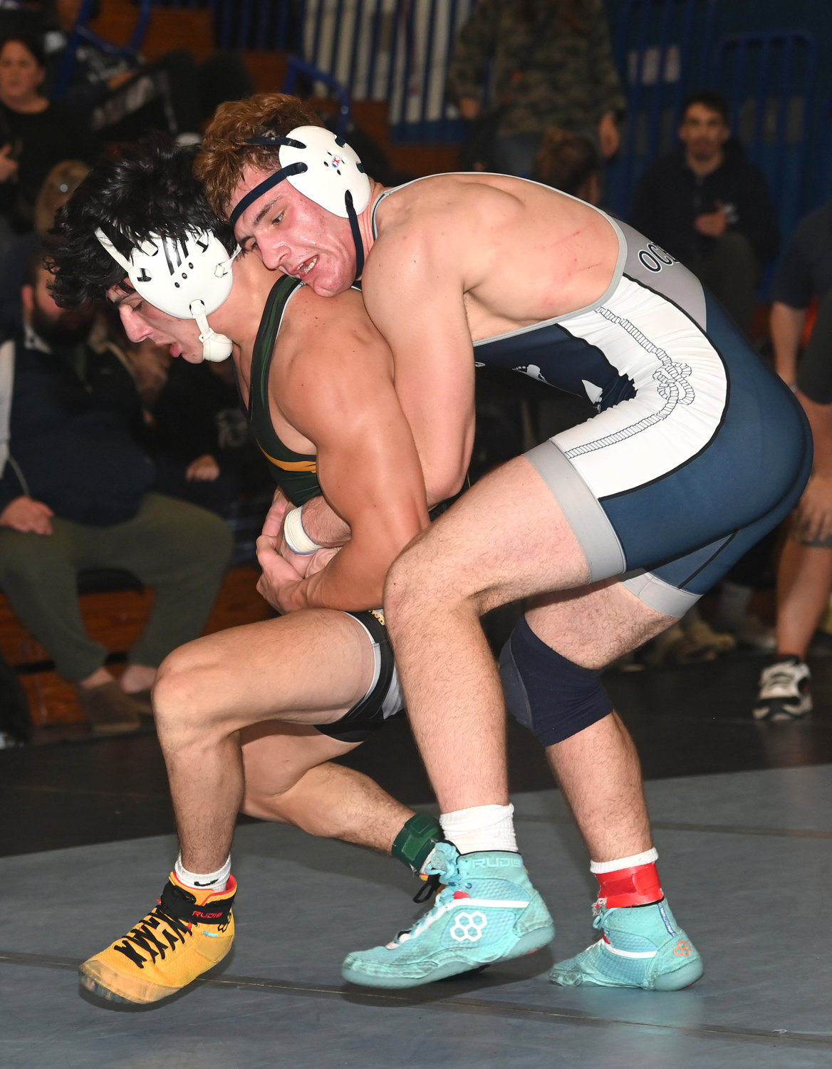 Oceanside’s Christian Scarlata, right, captured the 189-pound crown at the Battle at the Beach Tournament to make history for the Sailors.