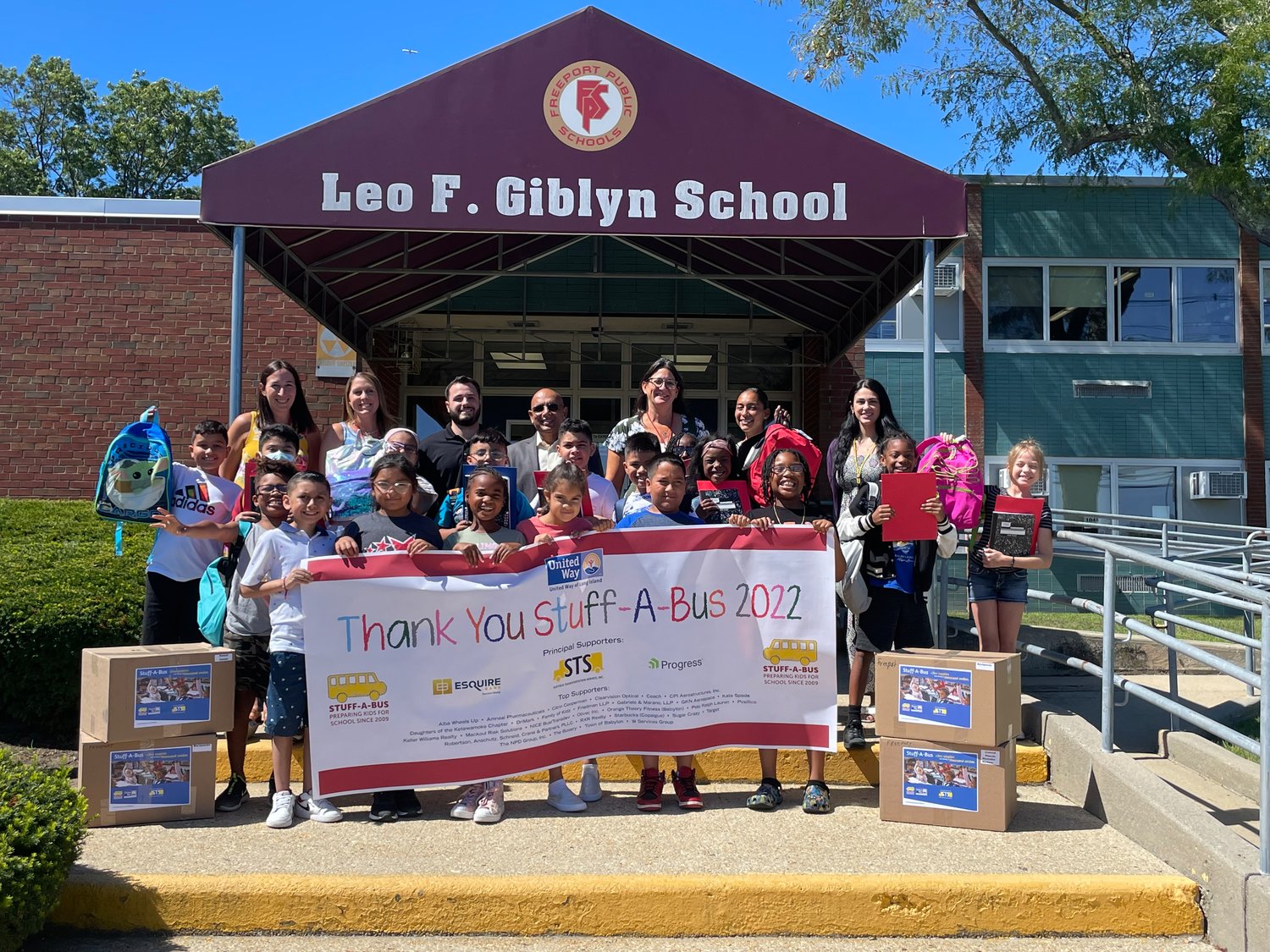Kishore Kuncham at the 2022 Stuff-A-Bus program with United Way of Long Island at Leo F. Giblyn School.
