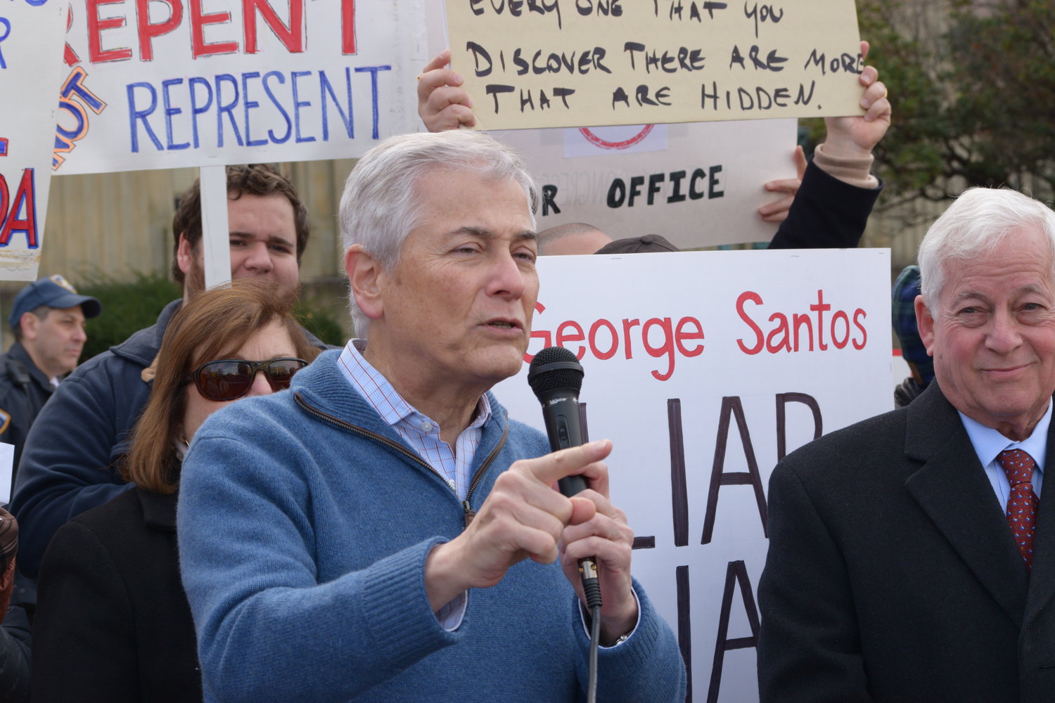 Robert Zimmerman, who lost to George Santos in their congressional race last month, joined other political leaders within his party in front of the Nassau County Courthouse in Mineola to condemn Santos and what they described as his lies into his background. They are calling for investigations into his background and finances, questioning how his income jumped from $55.000 annually to more than $1.75 million over the course of two years.